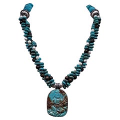 A.Jeschel Collier australien d'opales et de turquoises avec pendentif sculpté en forme de Bouddha.