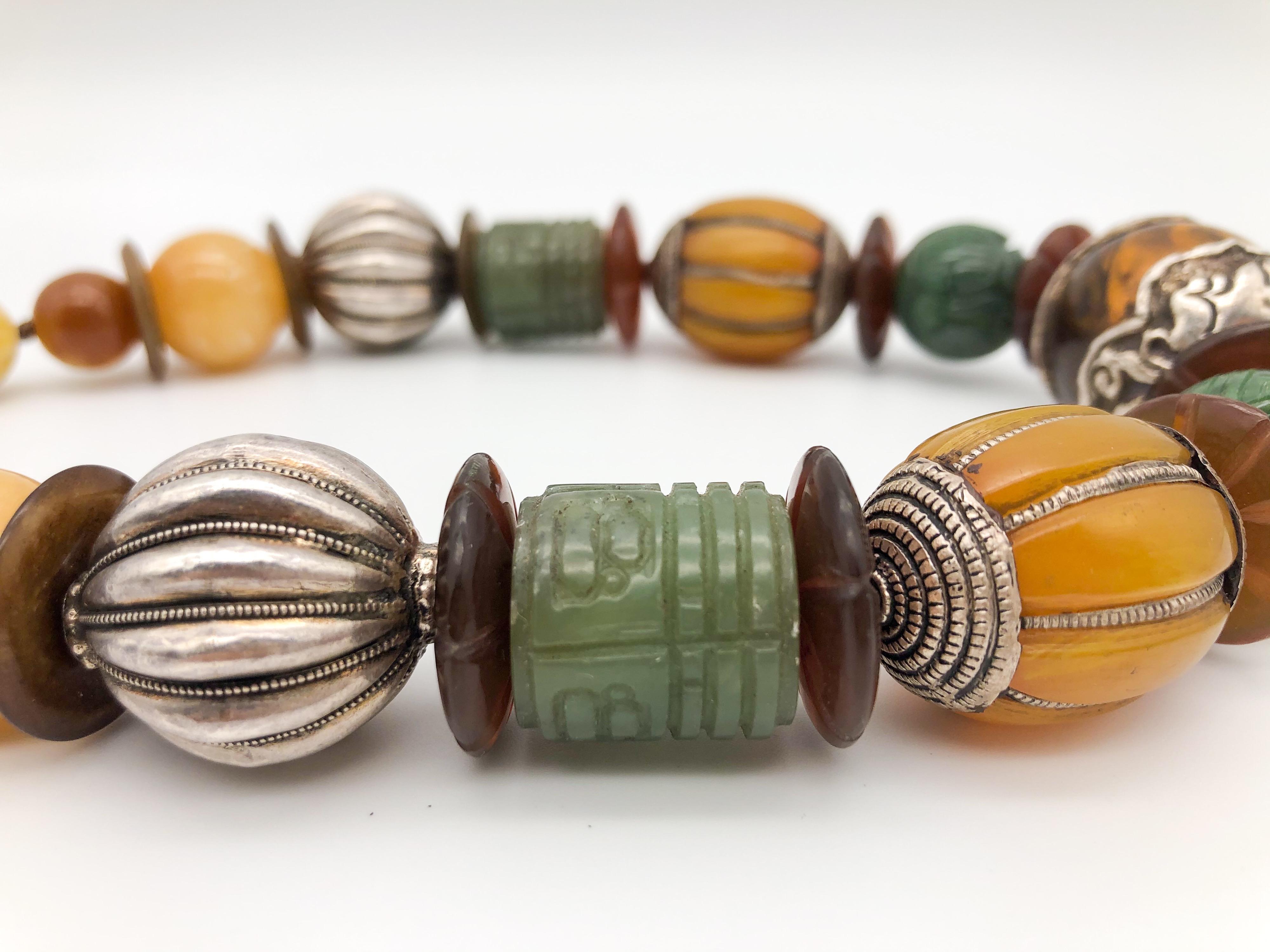 Women's A.Jeschel Bold Amber and carved Jade necklace.