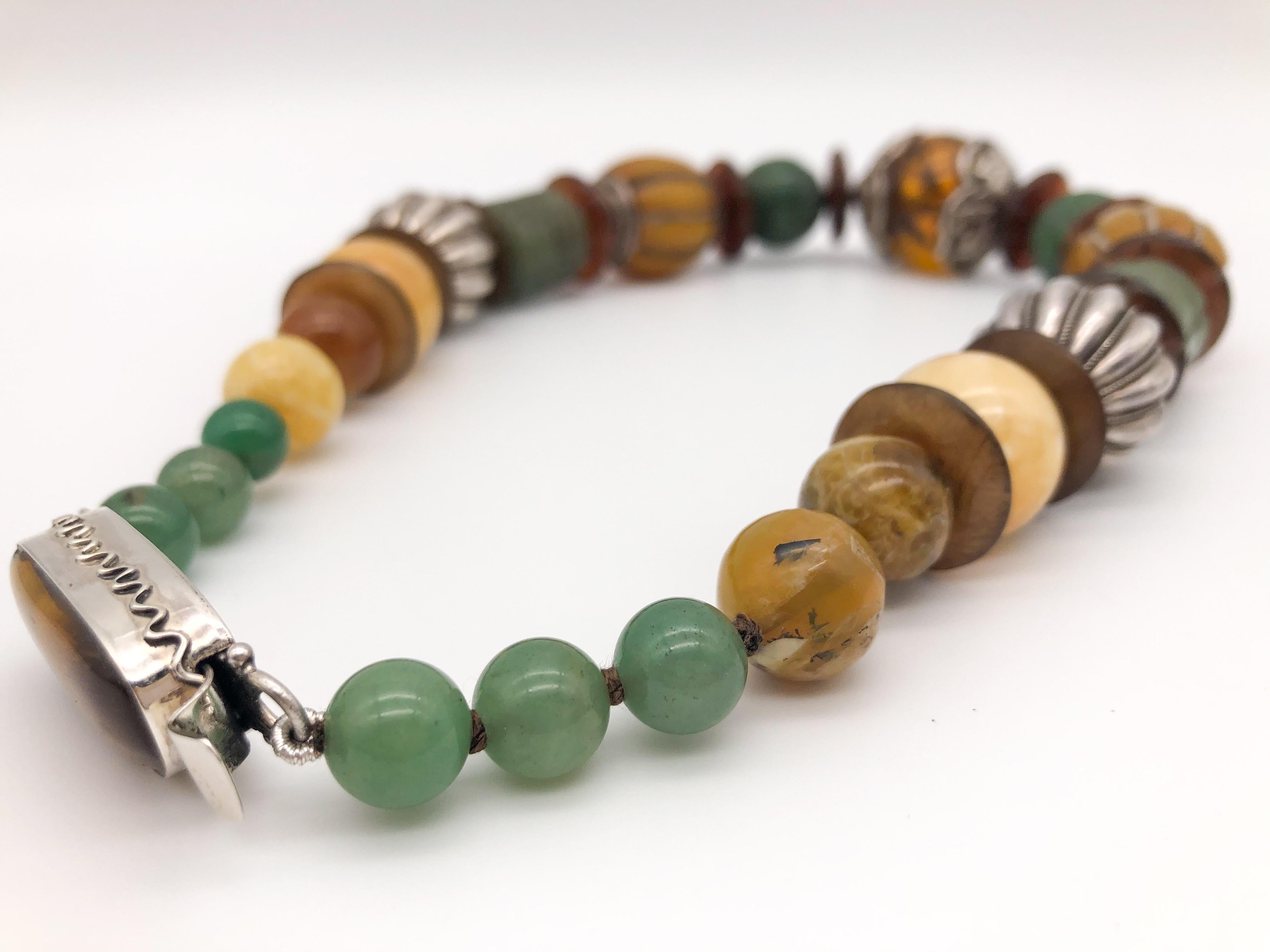 A.Jeschel Bold Amber and carved Jade necklace. 1