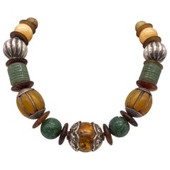 A.Jeschel Bold Amber and carved Jade necklace.   