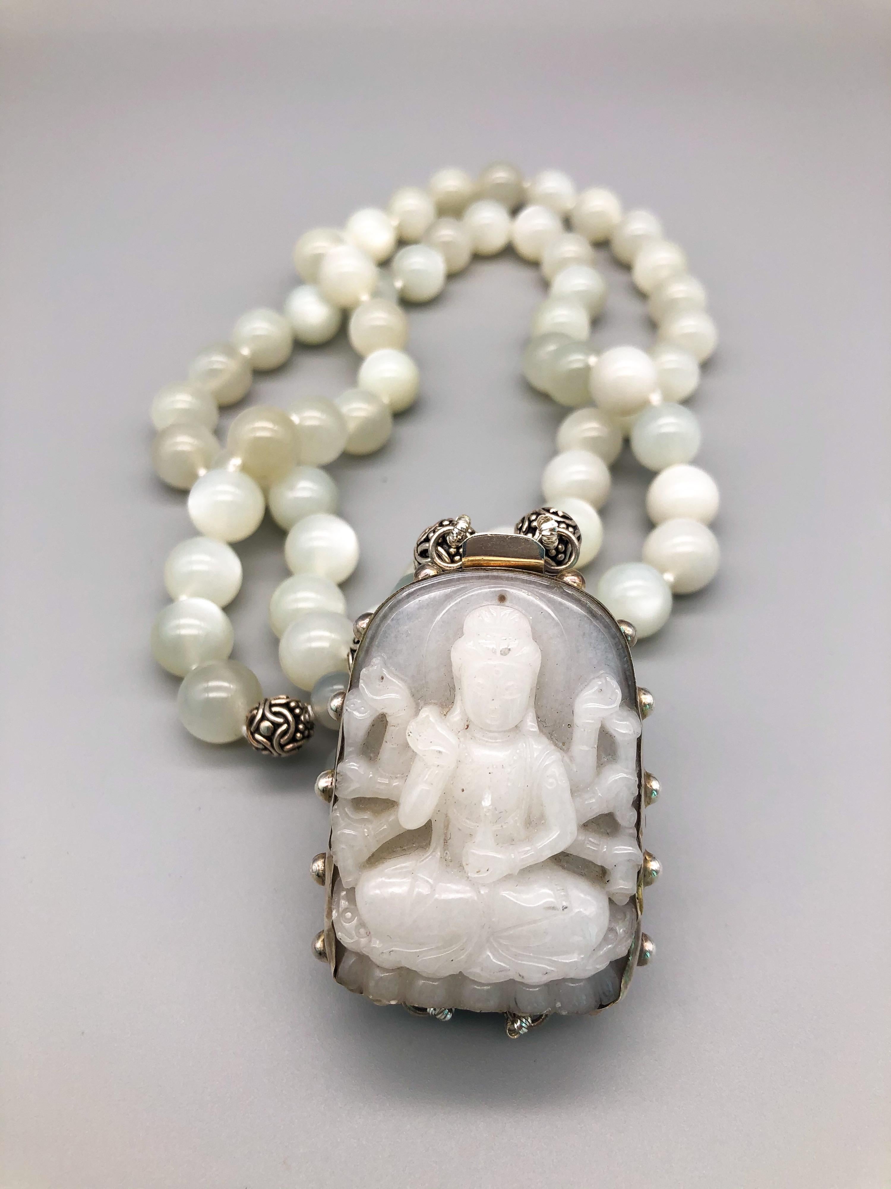 Contemporary A.Jeschel Carved Guan Yin surrounded by 2 strands of match Moonstone beads