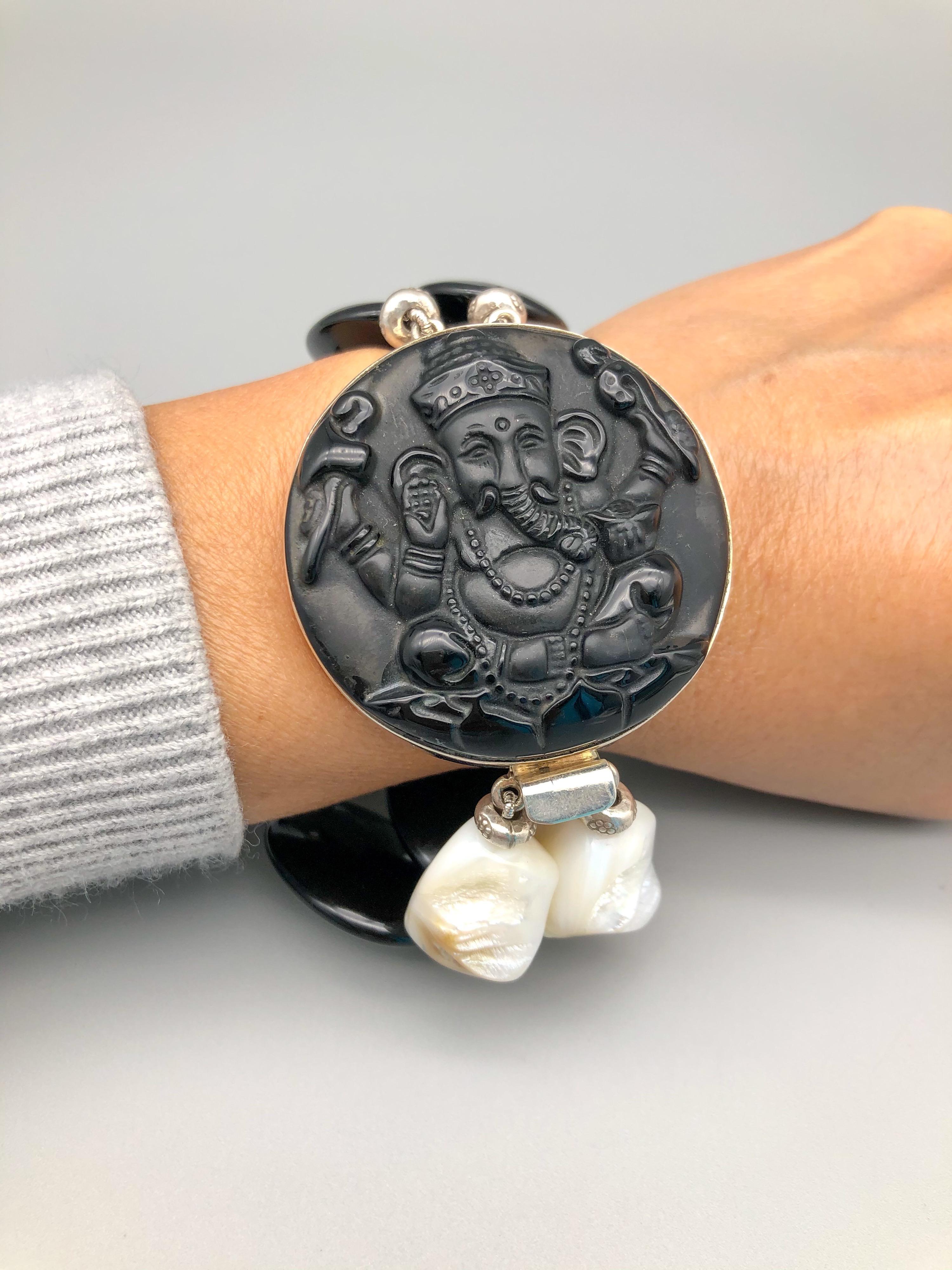 Contemporary A.Jeschel Statement bold Onyx bracelet with lord Ganesh carved clasp. For Sale