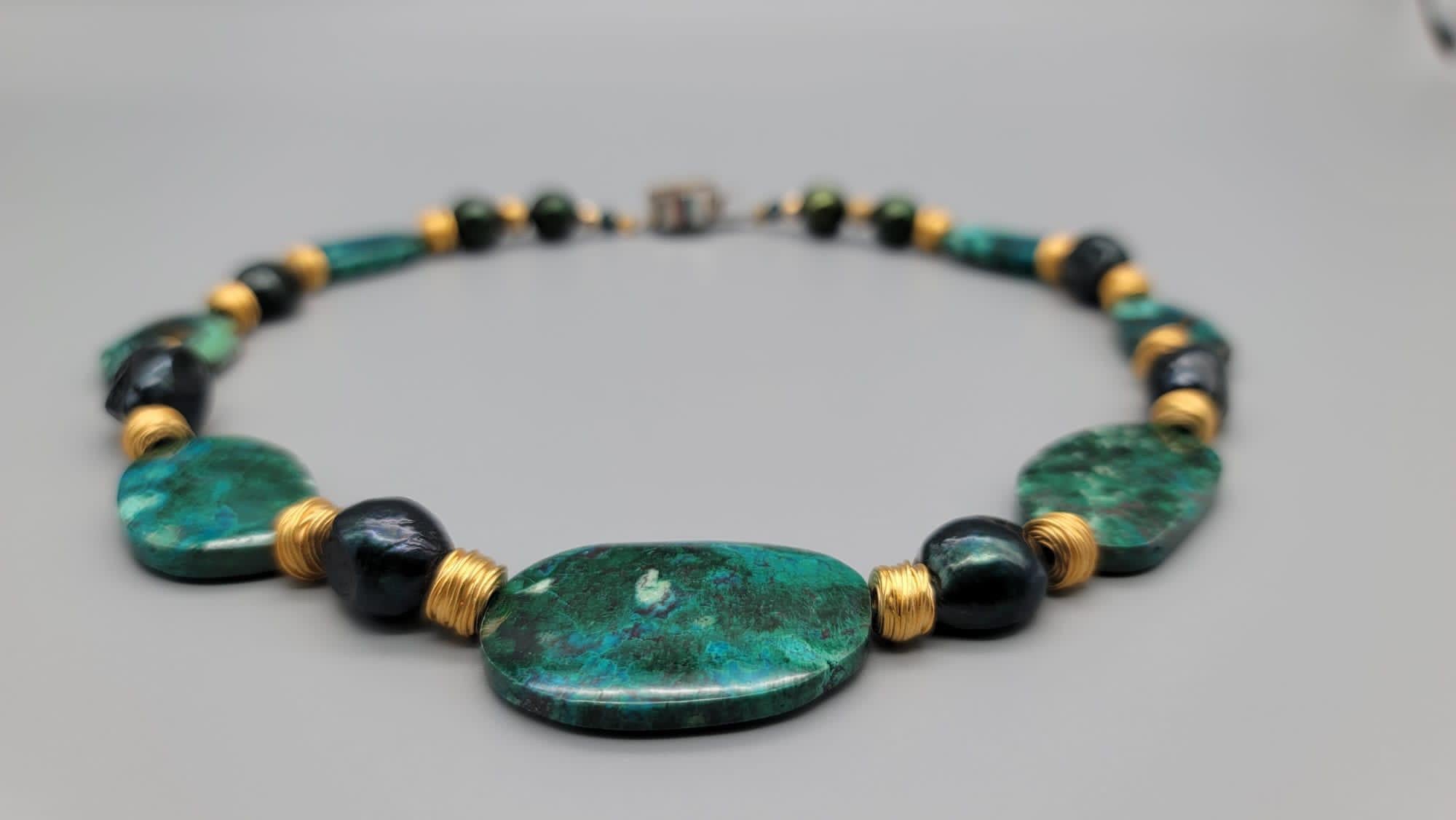 Contemporary A.Jeschel Chrysocolla necklace separated by green peacock Baroque Pearls. For Sale