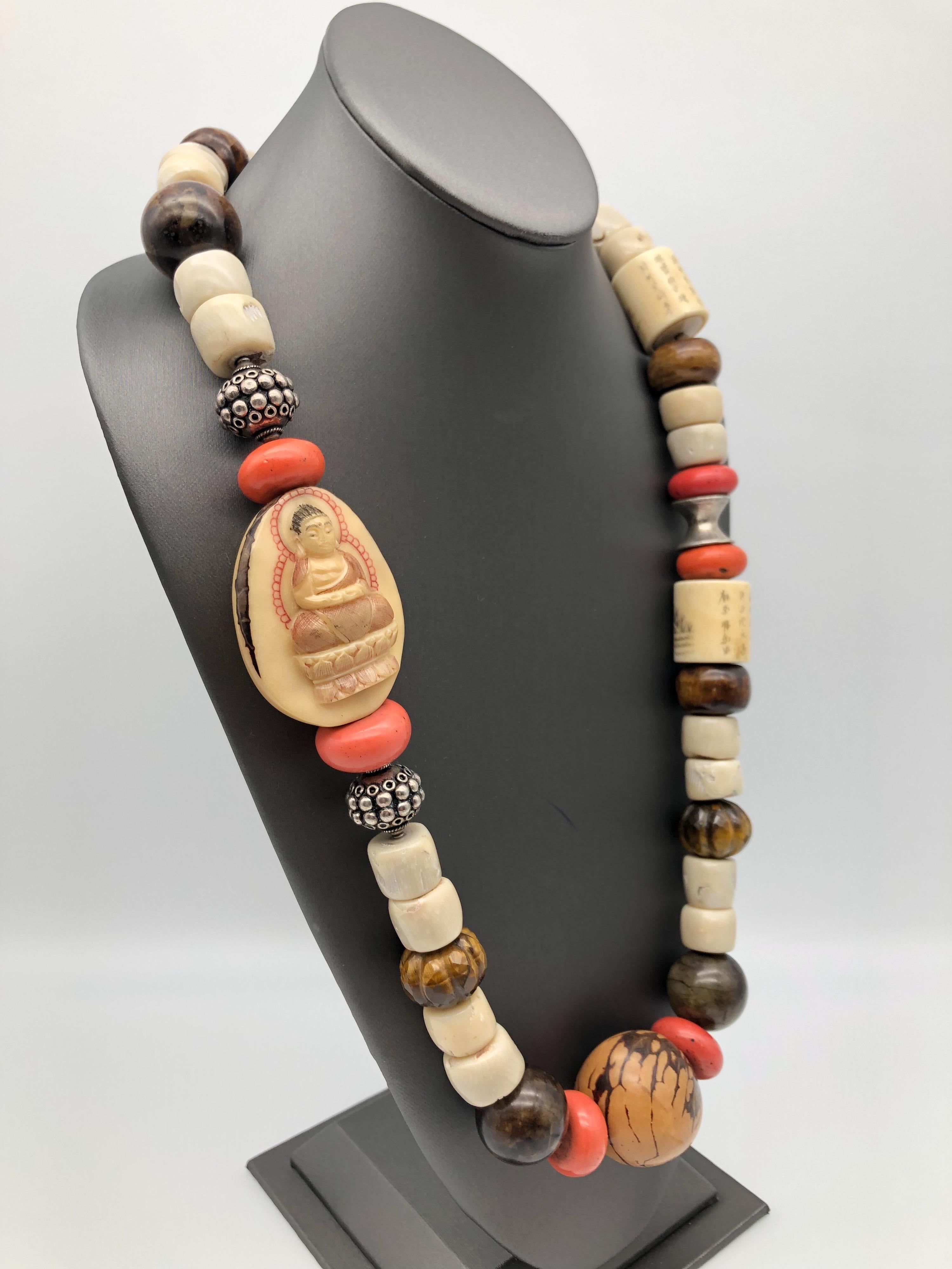 One-of-a-Kind
A remarkable contemporary necklace. Featuring stunning Bold pendant, Scrimshaw-Hand-Painted Buddha, and vintage Chinese beads are nicely finished with engraved 