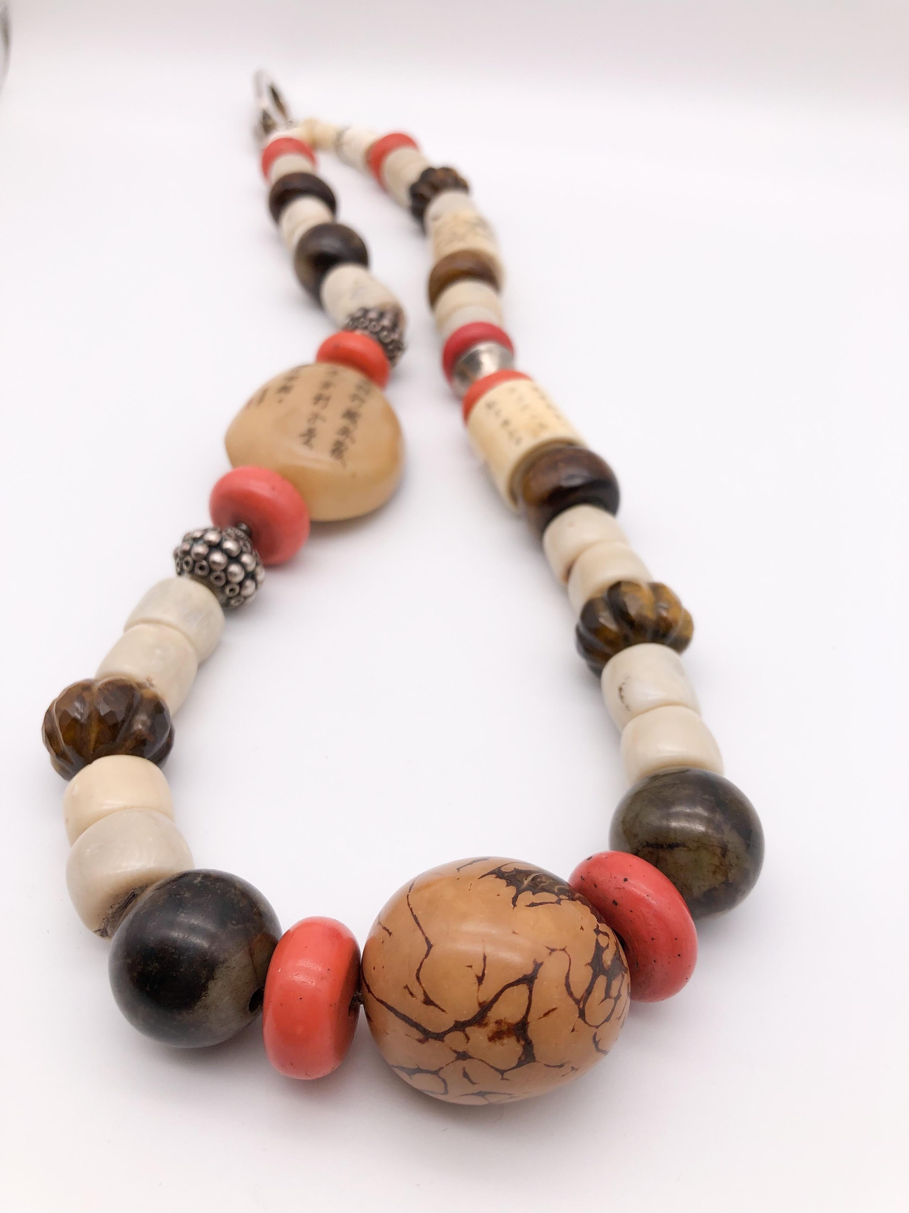 A.Jeschel Colorful Ethnic Tibetan beads and Carved Buddha necklace In New Condition For Sale In Miami, FL