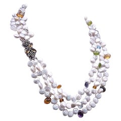 A.Jeschel  Delicate 3 strands of Freshwater Pearl