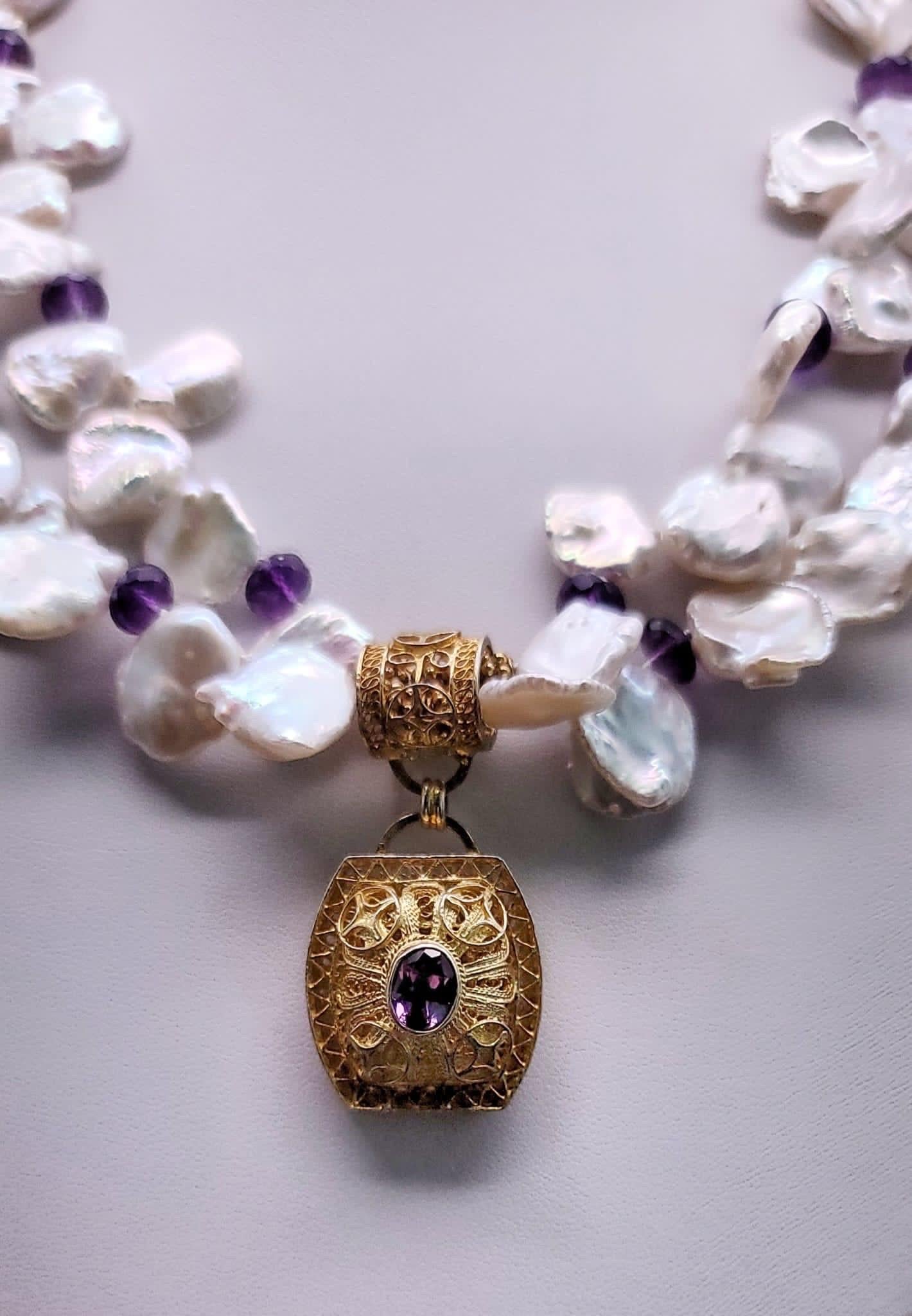 Contemporary A.Jeschel Double strand Keshi Pearl with an Amethyst vermeil pendant. For Sale