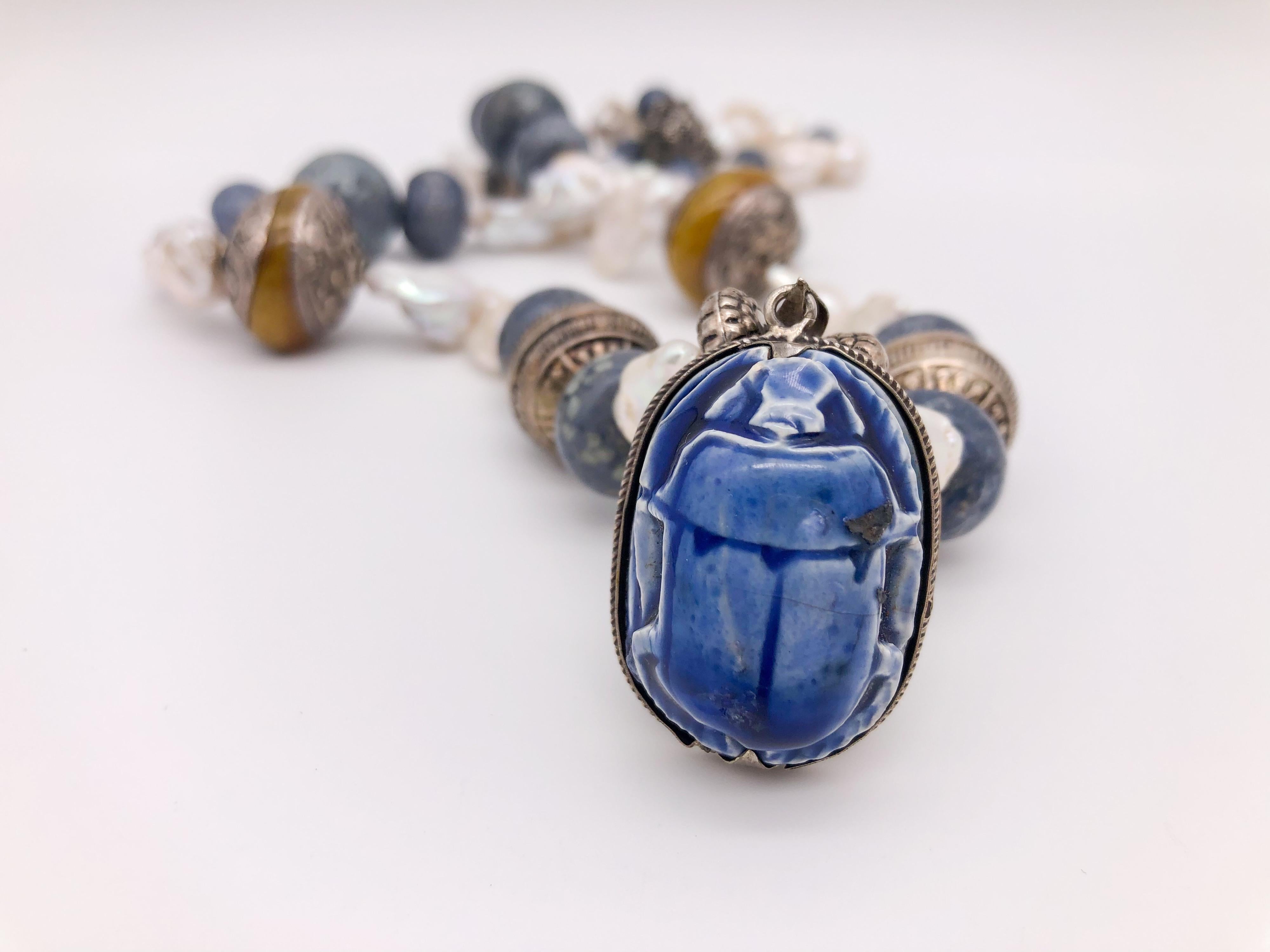 Mixed Cut A.Jeschel Egyptian vintage ceramic scarab, Amber and baroque Pearl necklace.