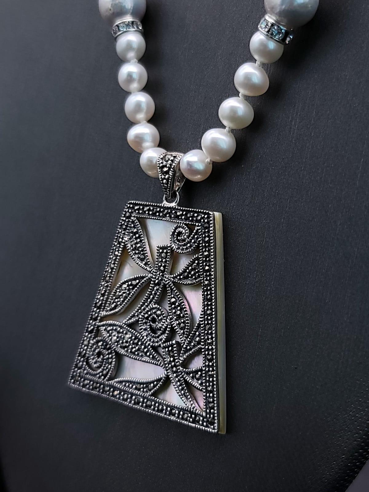Contemporary A.Jeschel Elegant Long Baroque Necklace with pendant. For Sale