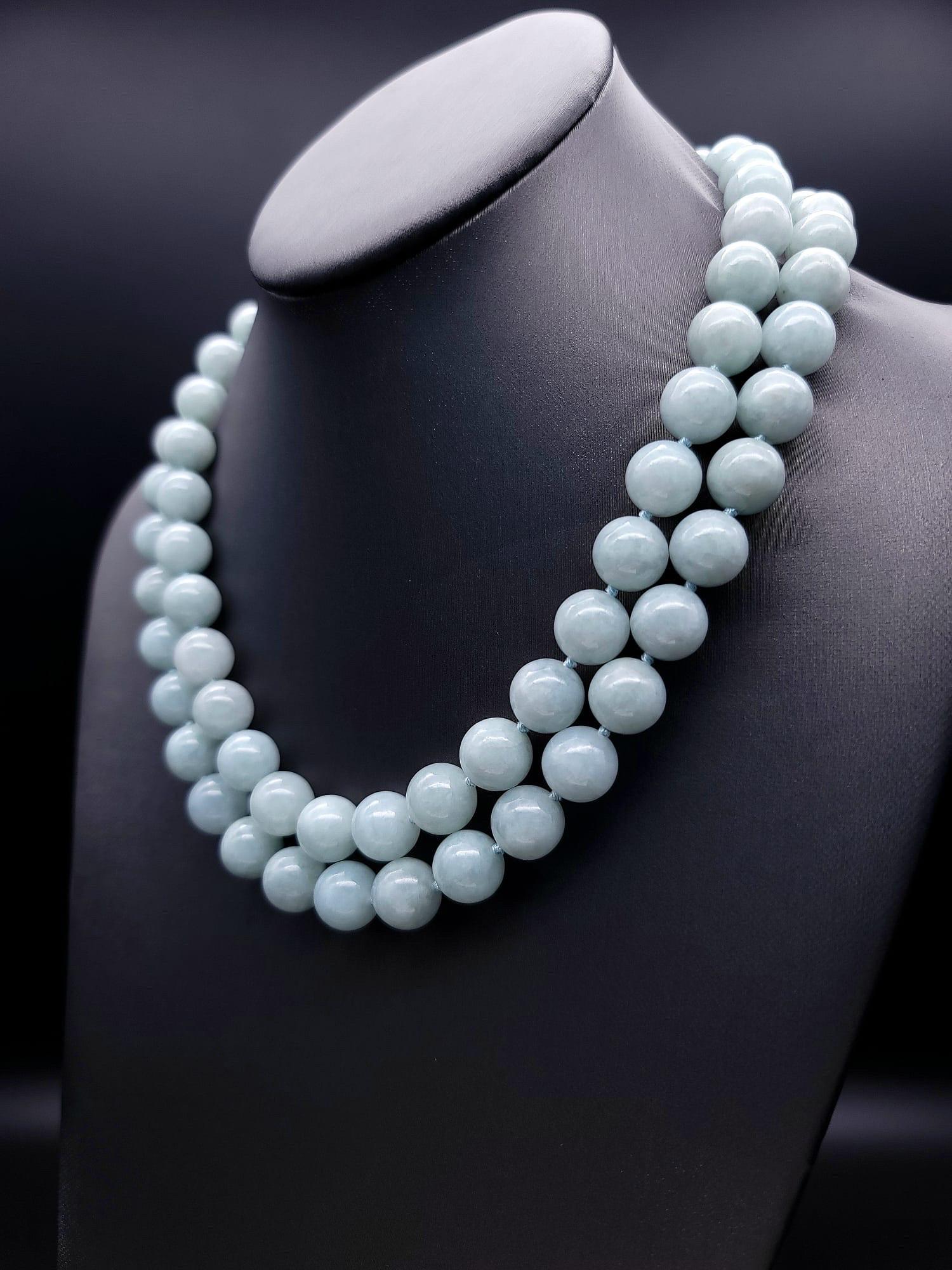 One-of-a-Kind

Make a statement with this elegant and sophisticated matched Burma Jade necklace. The 12mm beads are a beautiful soft green color and are hand-knotted for added luxury and durability. With its extravagant double-strand design, this