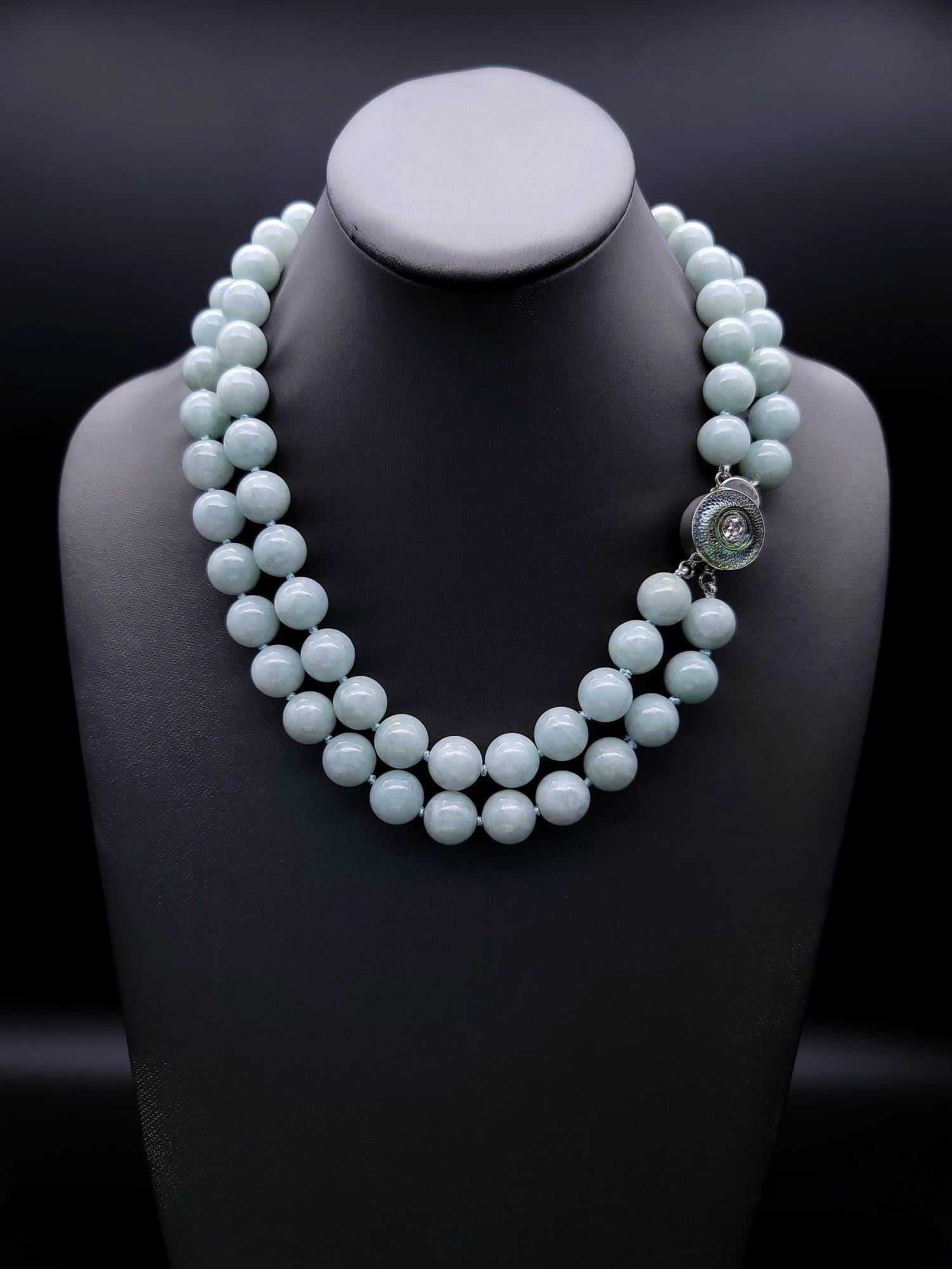 Women's or Men's A.Jeschel Elegant matched Burma Jade necklace with a signature clasp. For Sale