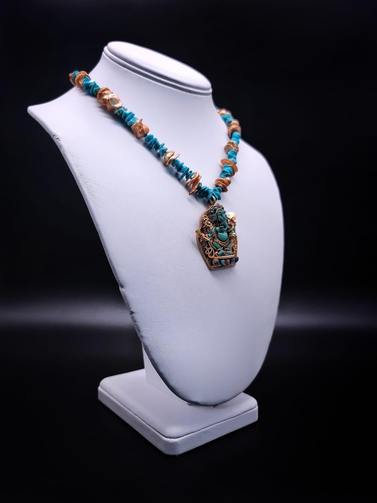 Contemporain A.Jeschel, élégant collier pendentif Ganesh en turquoise. en vente