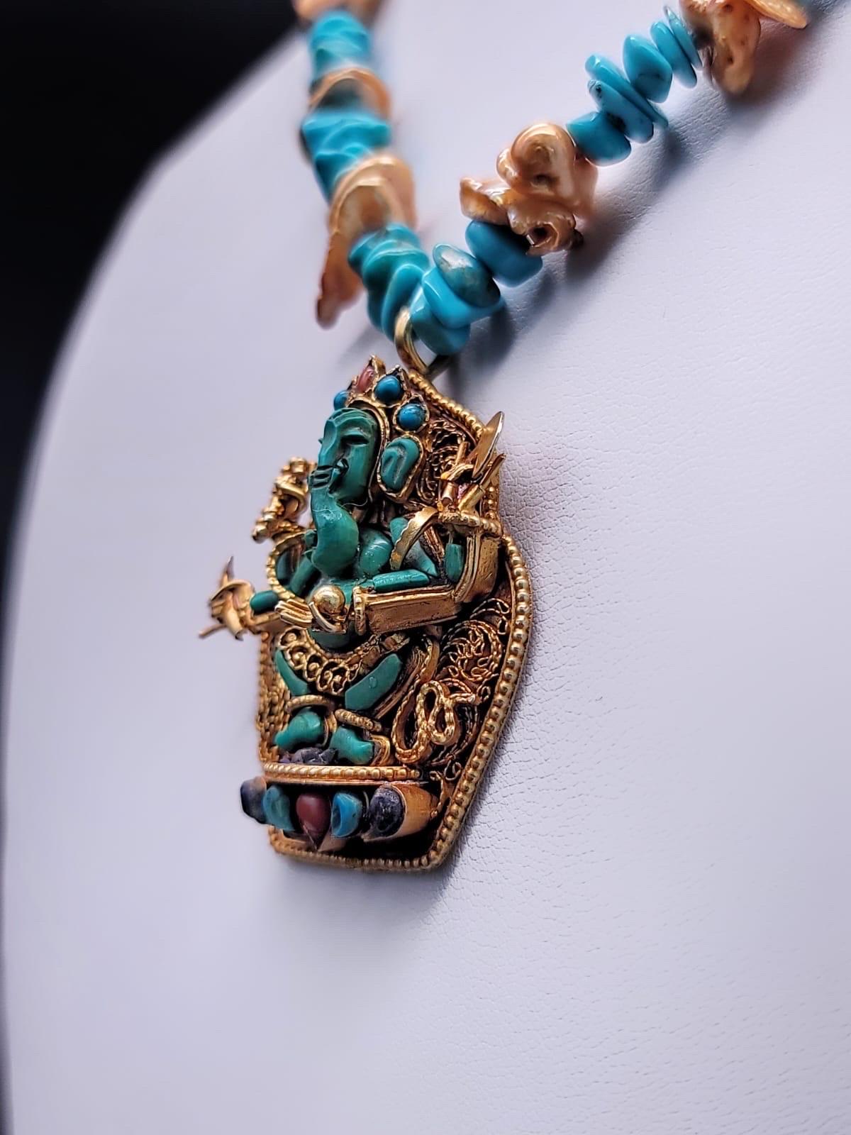 Contemporary A.Jeschel Elegant Turquoise Lord Ganesh pendant necklace.