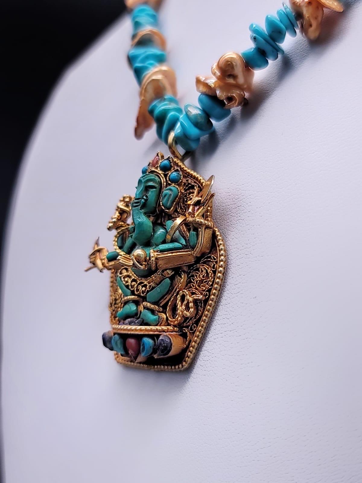 Taille mixte A.Jeschel, élégant collier pendentif Ganesh en turquoise. en vente