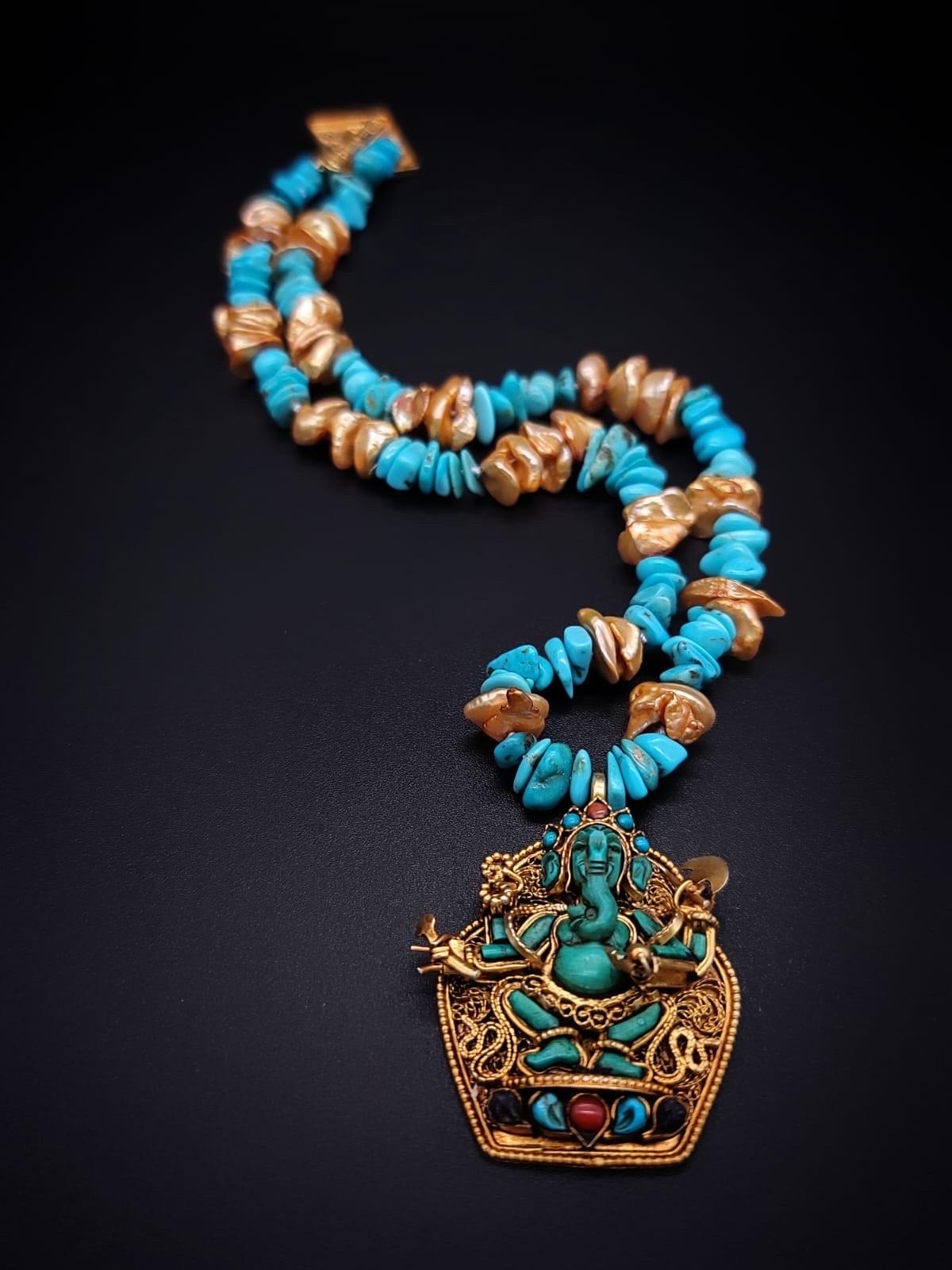 Mixed Cut A.Jeschel Elegant Turquoise Lord Ganesh pendant necklace.