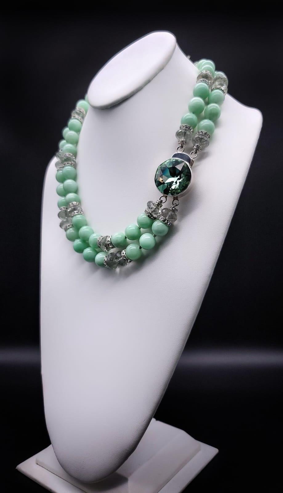 One-of-a-Kind

Green moonstone and green amethyst combine in an unusual 2 strand necklace. Seldom seen soft green translucent moonstone, mixed with elegant faceted green amethyst, accented with silvery c.z. roundels for a bit of sparkle make-up this