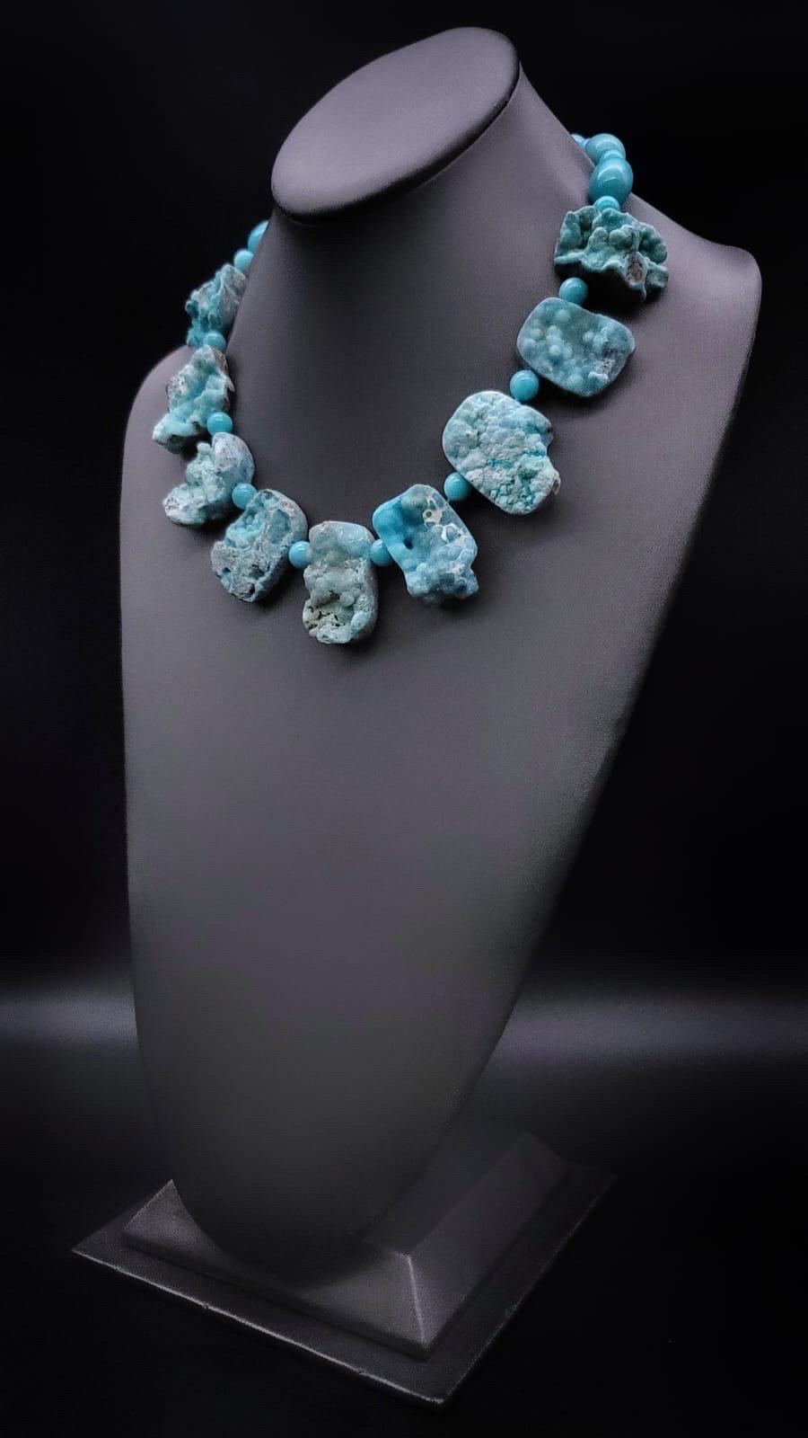 One-of-a-Kind

Hemimorphite- a most unusual gemstone because of its unique physical properties and difficulties in cutting, hemimorphite is best left in its natural druzy form. The light-to-dark teal crystals cling to the rock. The stunning rough