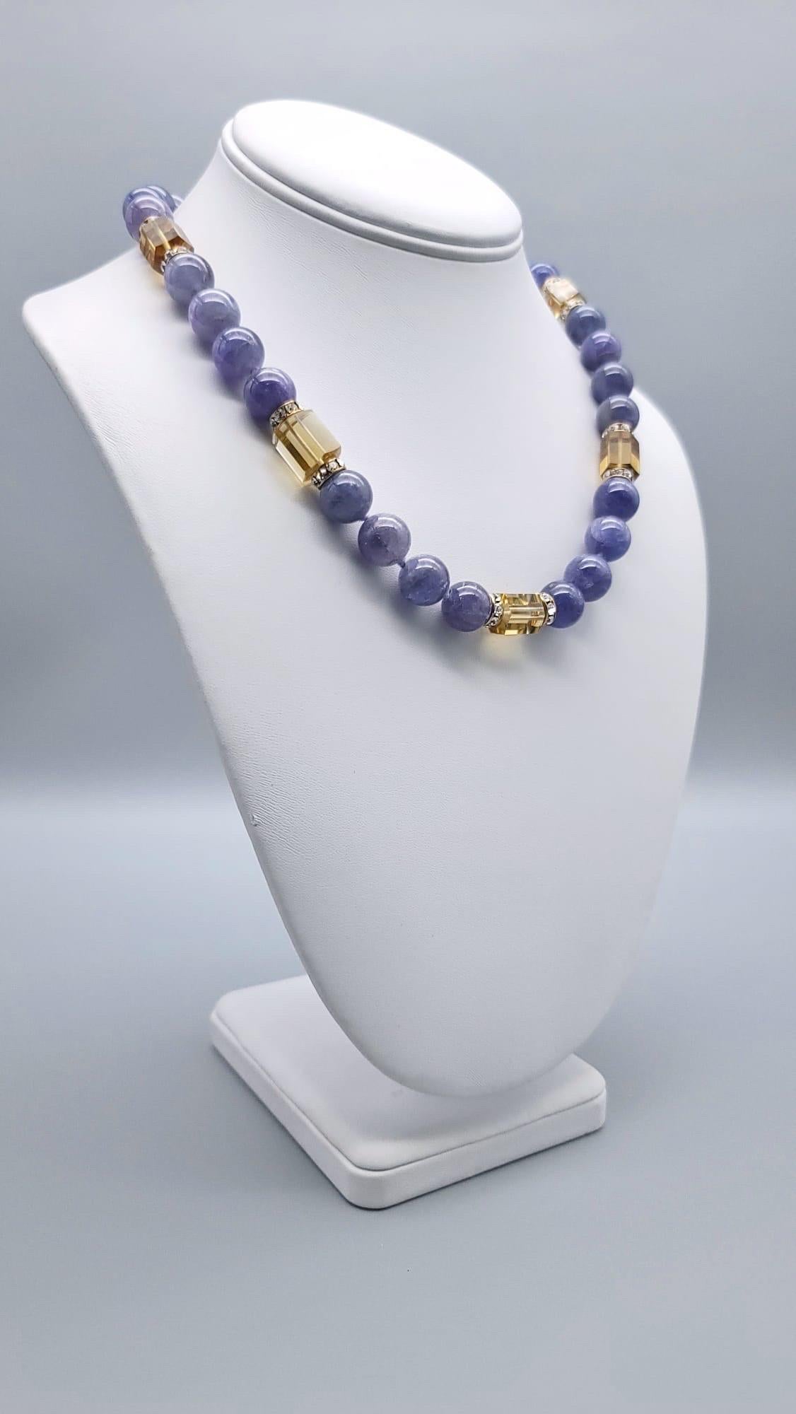 One-of-a-Kind
This Tanzanite and Quartz stunner necklace is the perfect combination of elegance and sophistication. With its 12mm polished Tanzanite beads spaced between square-cut citrine Quartz rods and c.z and vermeil roundels, it's sure to turn
