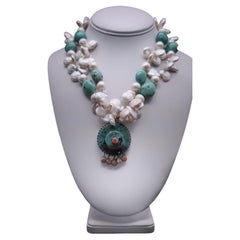 Antique A.Jeschel Flattering Turquoise and Pearl necklace with Tibetan Pendant.