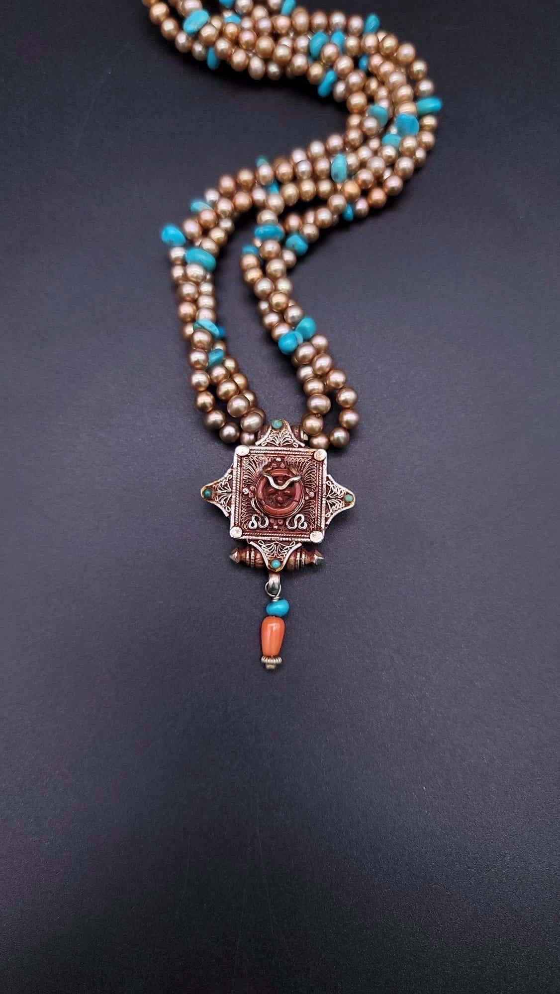 A.Jeschel  Stunning Freswater pearl necklace with a Vintage Tibetan pendant . In New Condition For Sale In Miami, FL