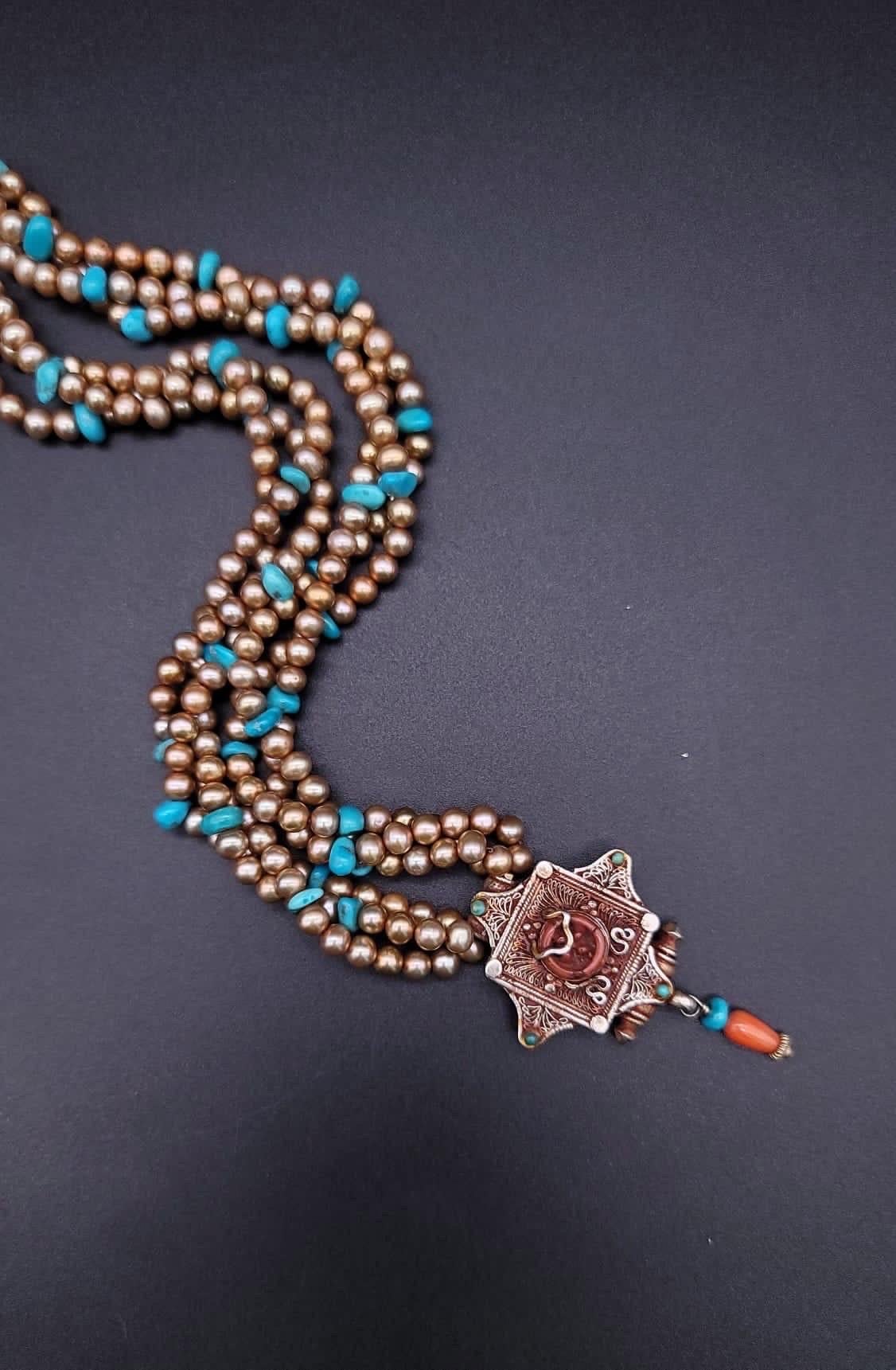 A.Jeschel  Stunning Freswater pearl necklace with a Vintage Tibetan pendant . For Sale 1