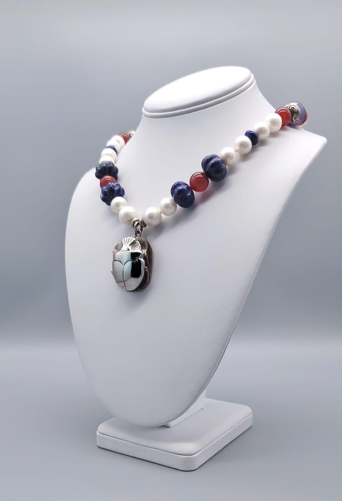 Contemporary A.Jeschel  Freshwater Pearl and Lapis necklace with a silver scarab pendant. For Sale