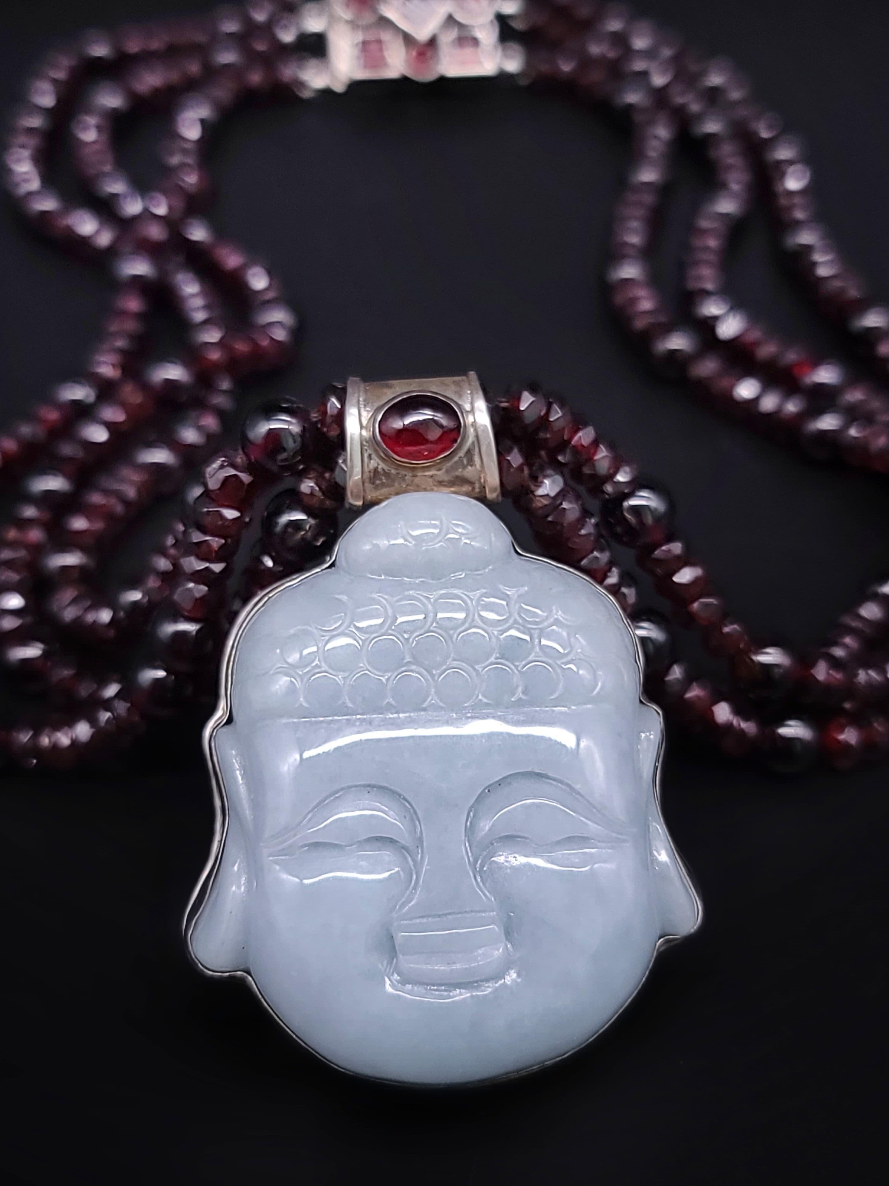 A.Jeschel  Garnet with a Jade carved Buddha pendant necklace. 1