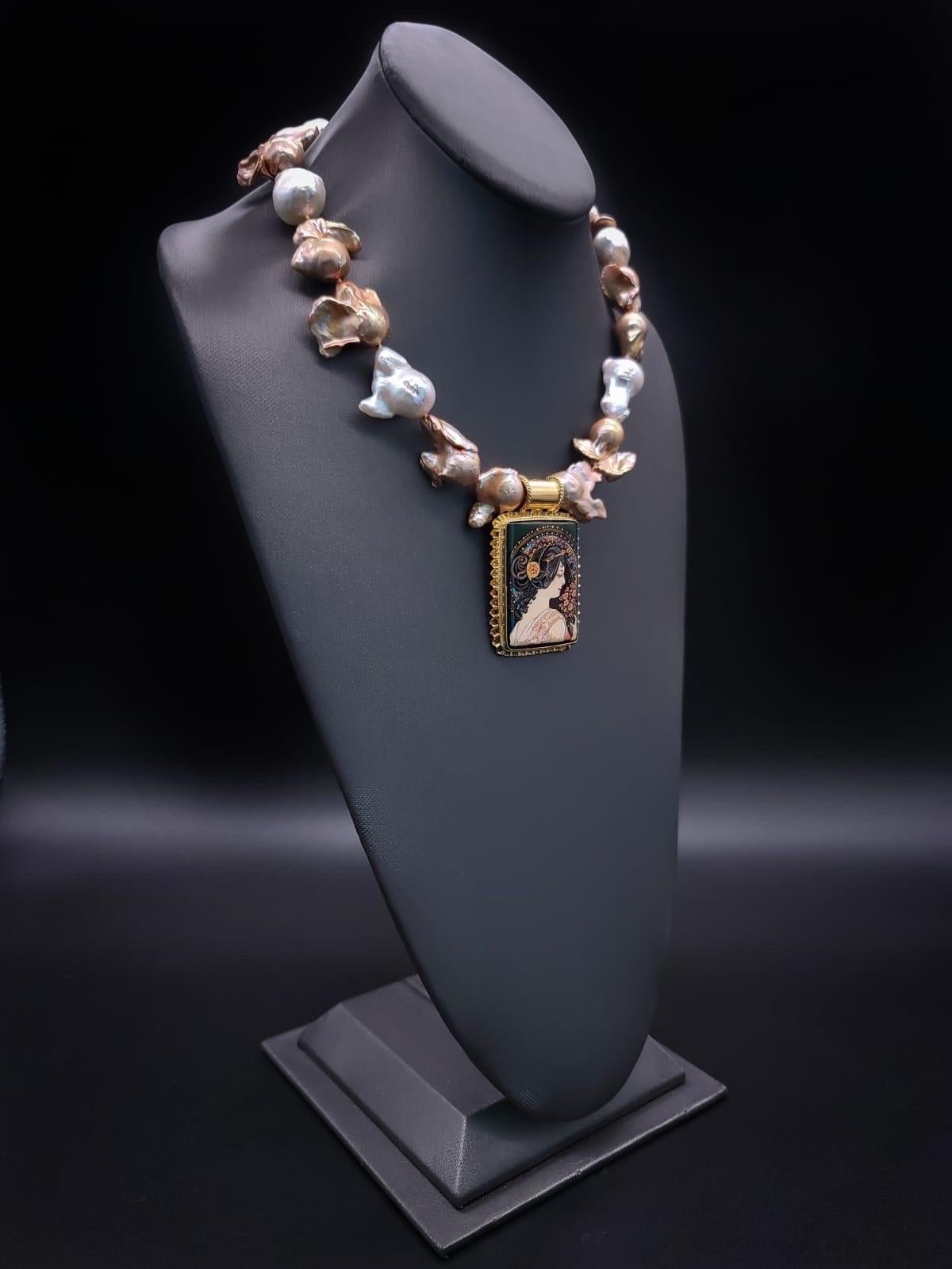 Contemporary A.Jeschel Glamorous Baroque Pearl with an Art Deco miniature pendant.