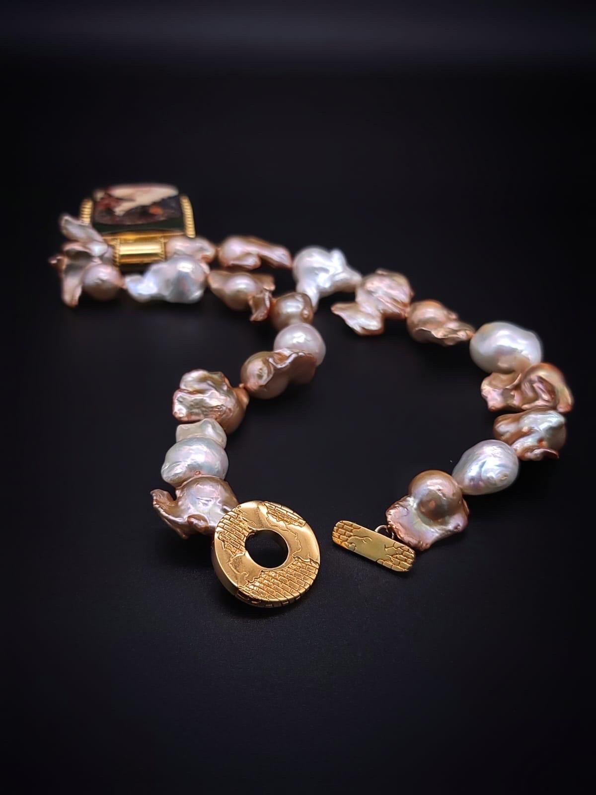 A.Jeschel Glamorous Baroque Pearl with an Art Deco miniature pendant. 1