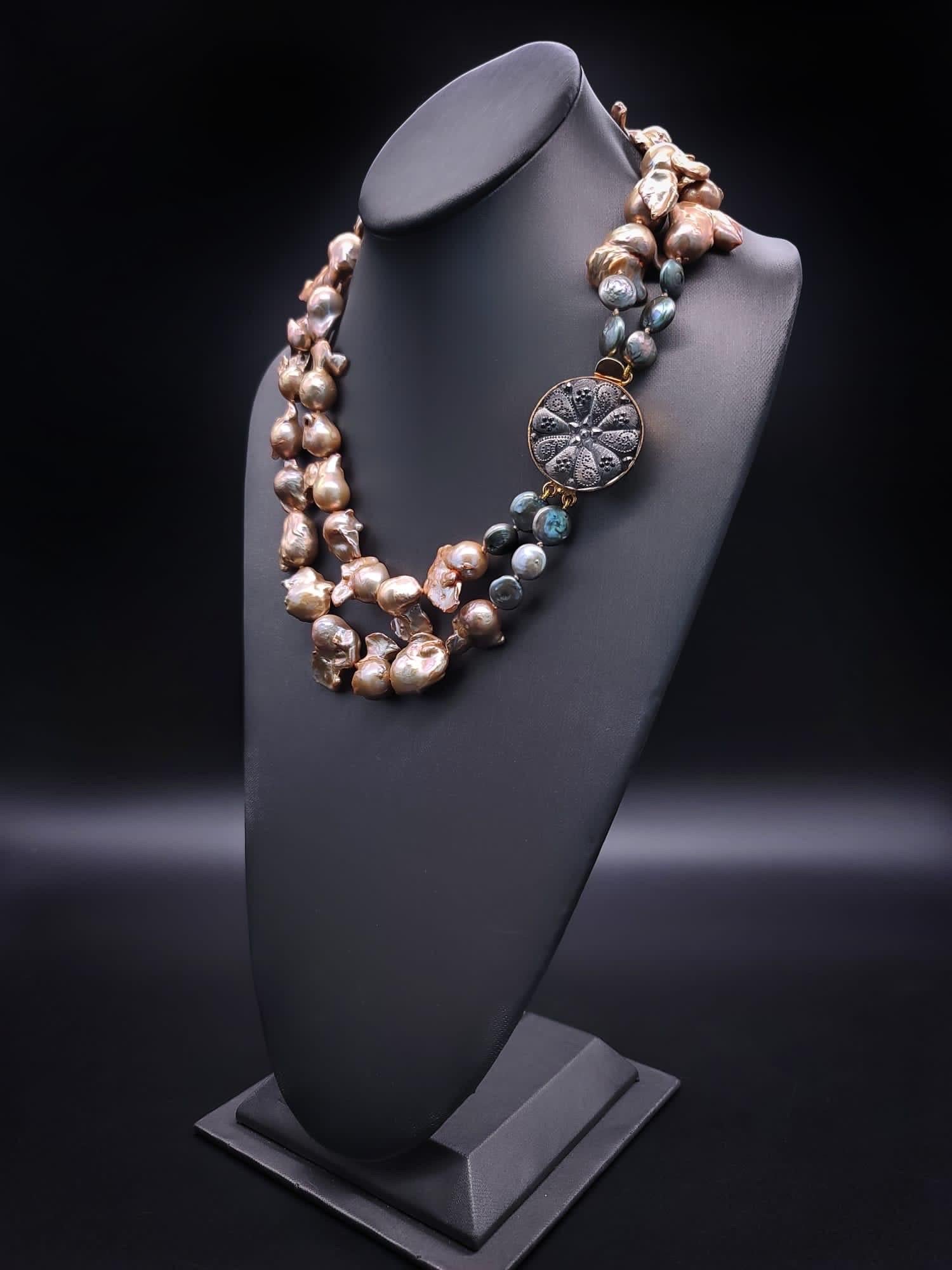 A.Jeschel Gold Baroque Pearl Necklace with a signature clasp. 11
