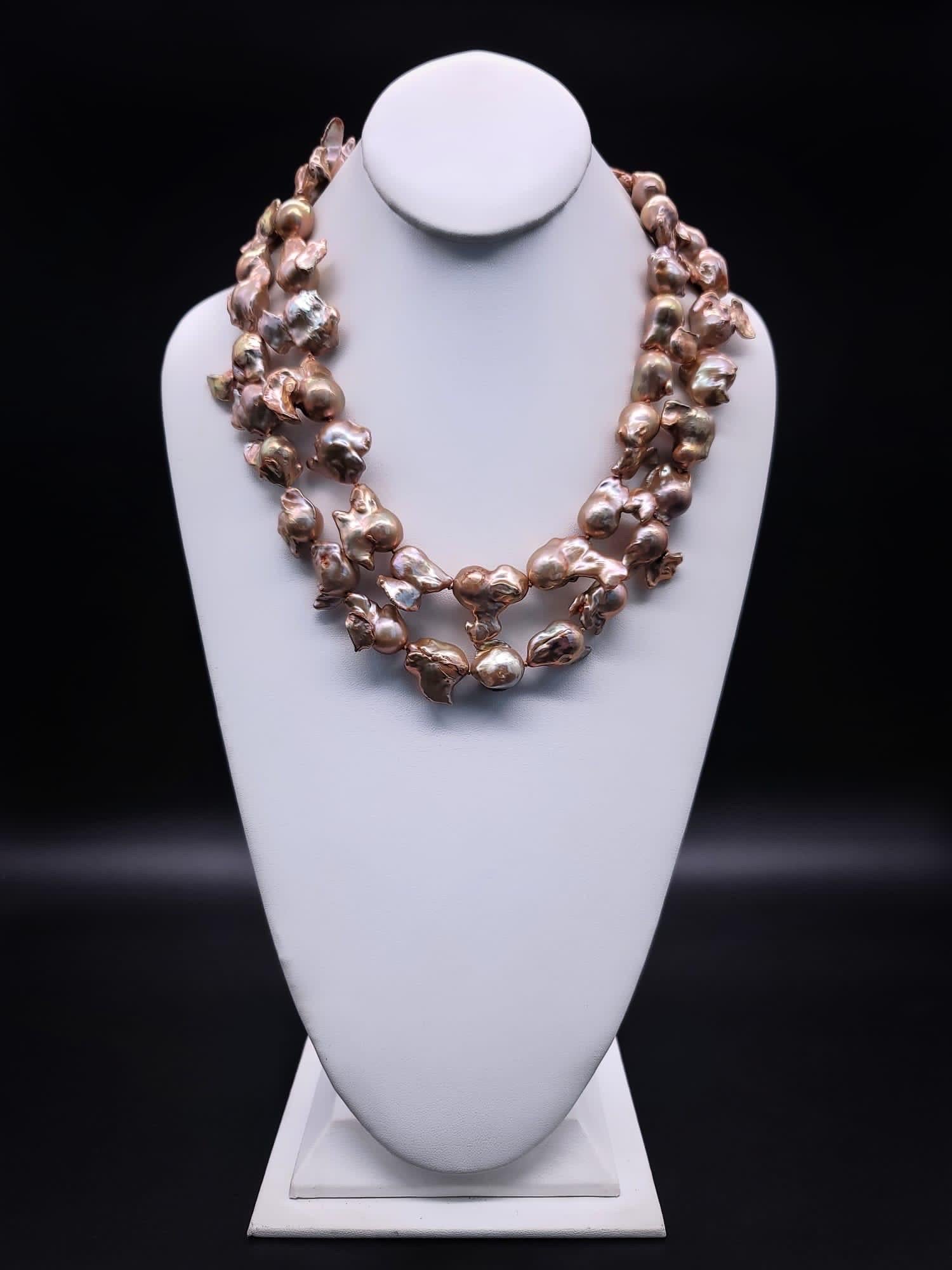 Contemporary A.Jeschel Gold Baroque Pearl Necklace with a signature clasp.