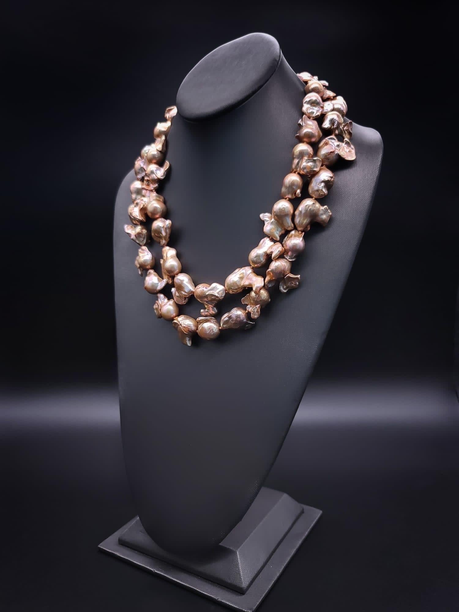 A.Jeschel Gold Baroque Pearl Necklace with a signature clasp. 1