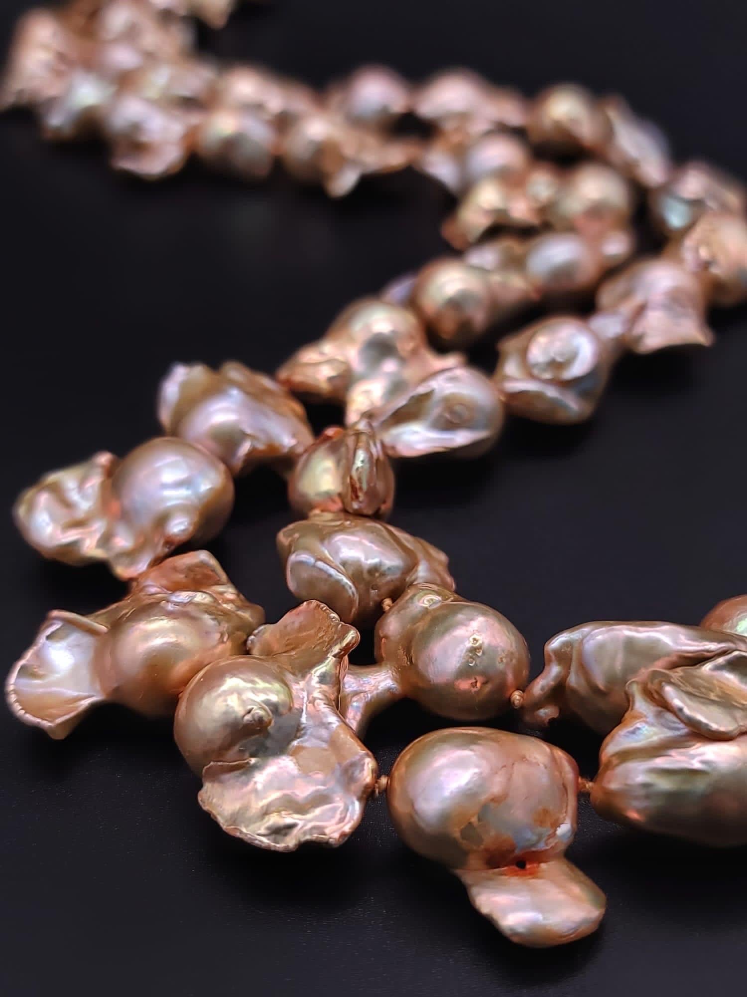 A.Jeschel Gold Baroque Pearl Necklace with a signature clasp. 2