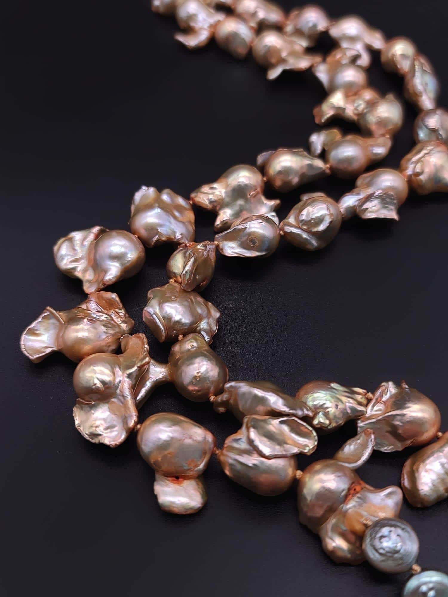 A.Jeschel Gold Baroque Pearl Necklace with a signature clasp. 3