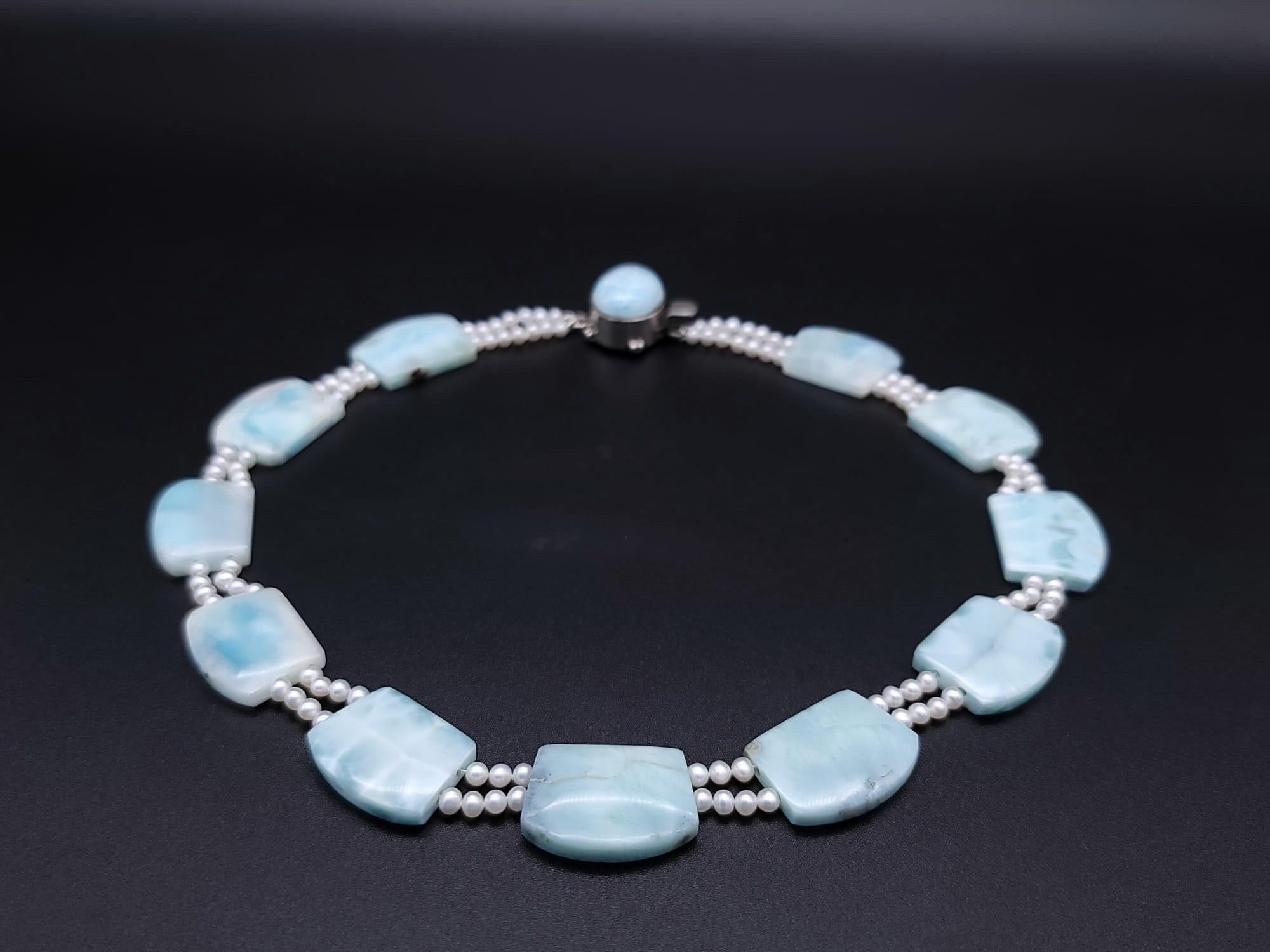One-of-a-Kind

Gentle as a Caribbean breeze this softly colored Larimar and Pearl necklace is about as romantic as a necklace can be. Larimar, found only in the Dominican Republic, often referred to as “the blue Jewel of the Caribbean
