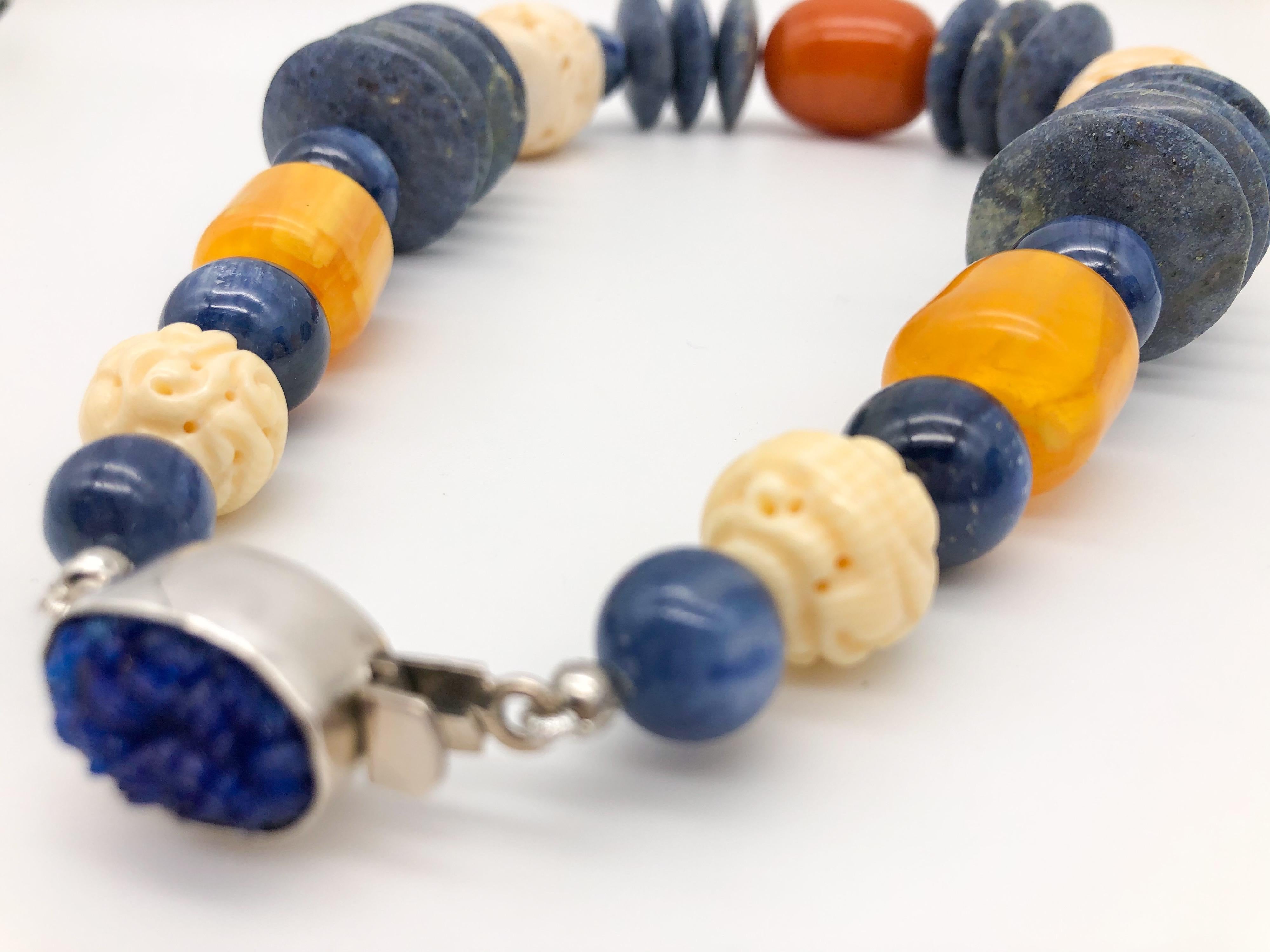 A.Jeschel Kyanite, coral, sodalite combine in bold, strong necklace.  4