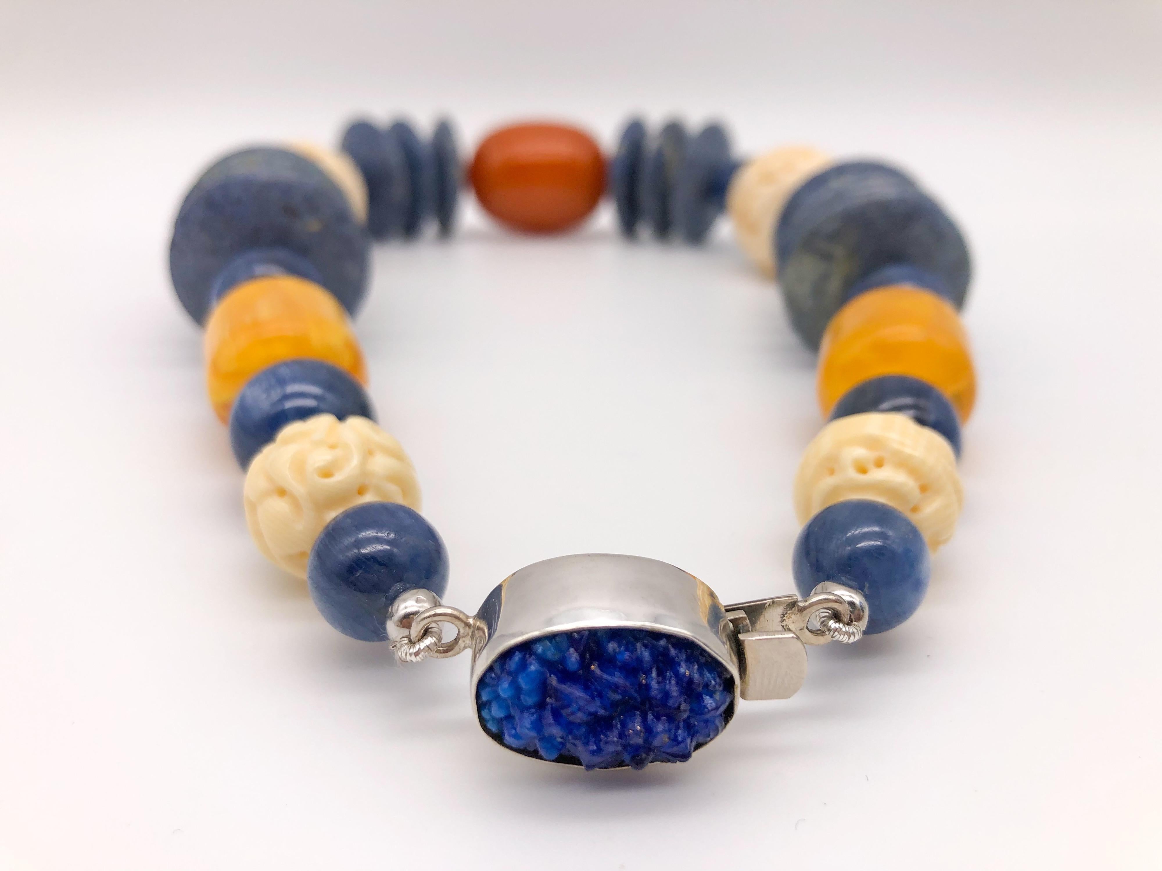 A.Jeschel Kyanite, coral, sodalite combine in bold, strong necklace.  5
