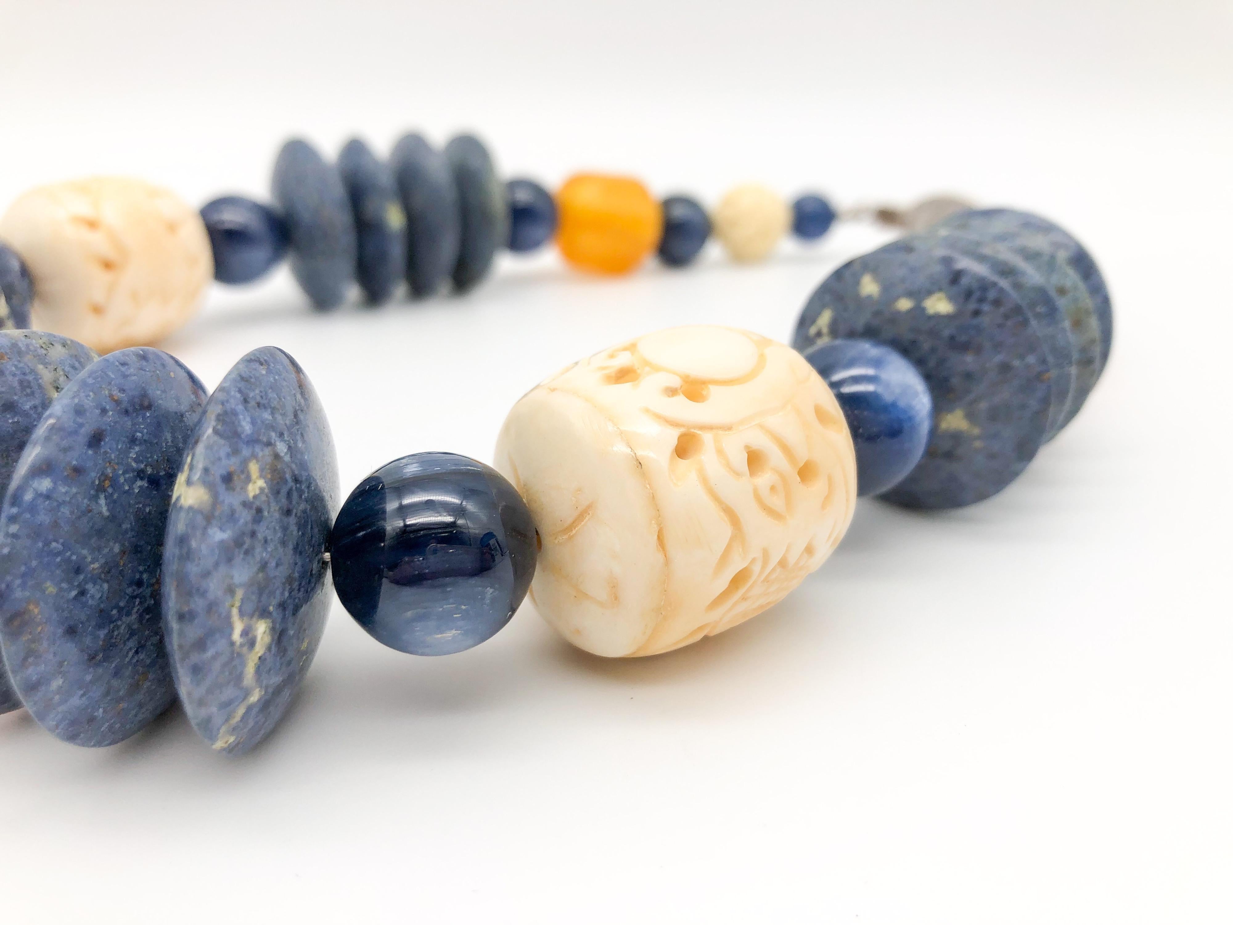 A.Jeschel Kyanite, coral, sodalite combine in bold, strong necklace.  6