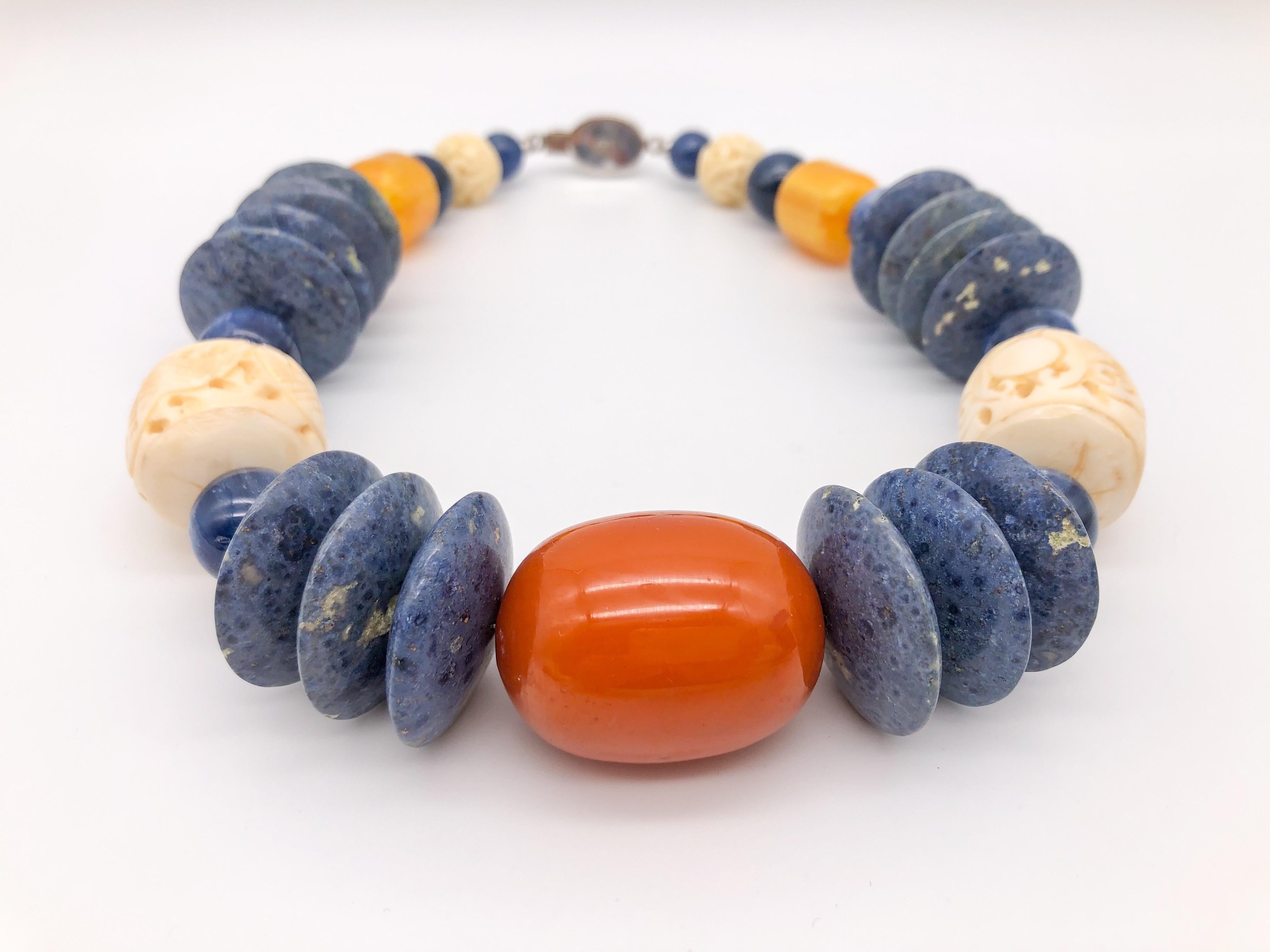 A.Jeschel Kyanite, coral, sodalite combine in bold, strong necklace.  7