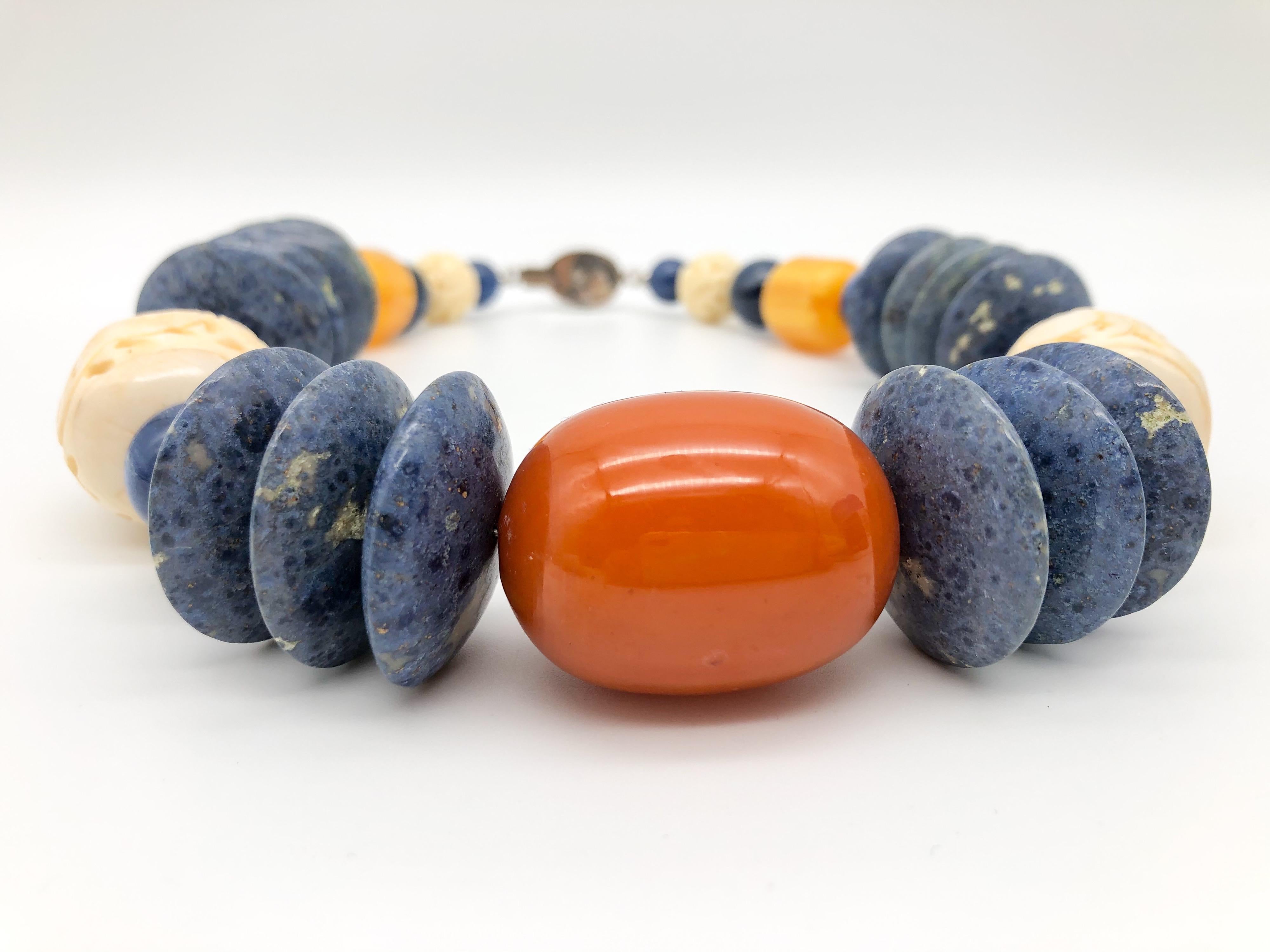 Contemporary A.Jeschel Kyanite, coral, sodalite combine in bold, strong necklace. 