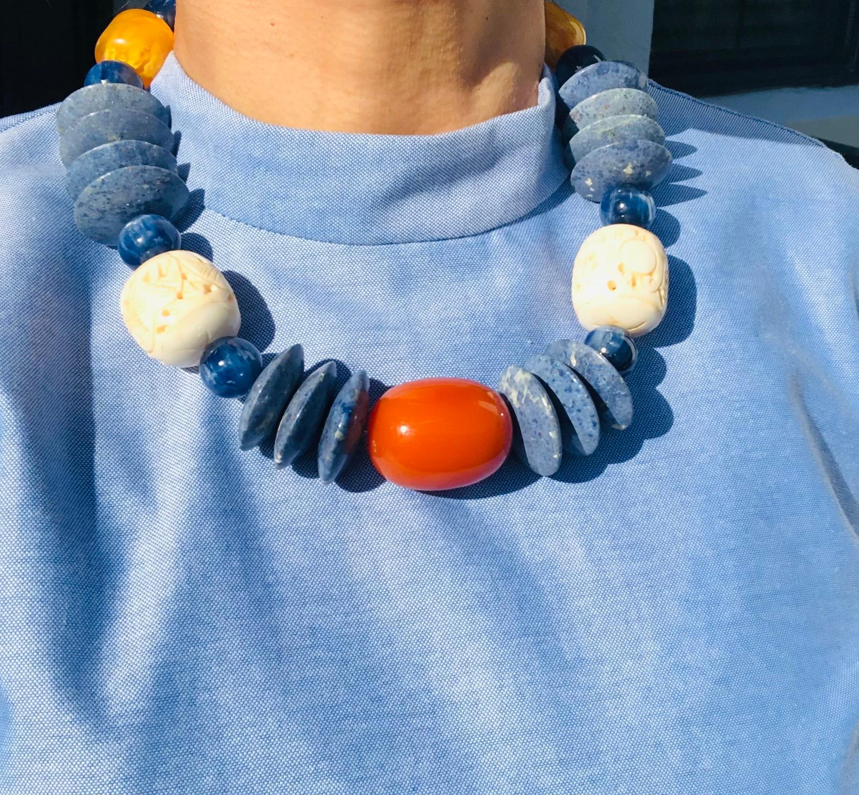 Mixed Cut A.Jeschel Kyanite, coral, sodalite combine in bold, strong necklace. 