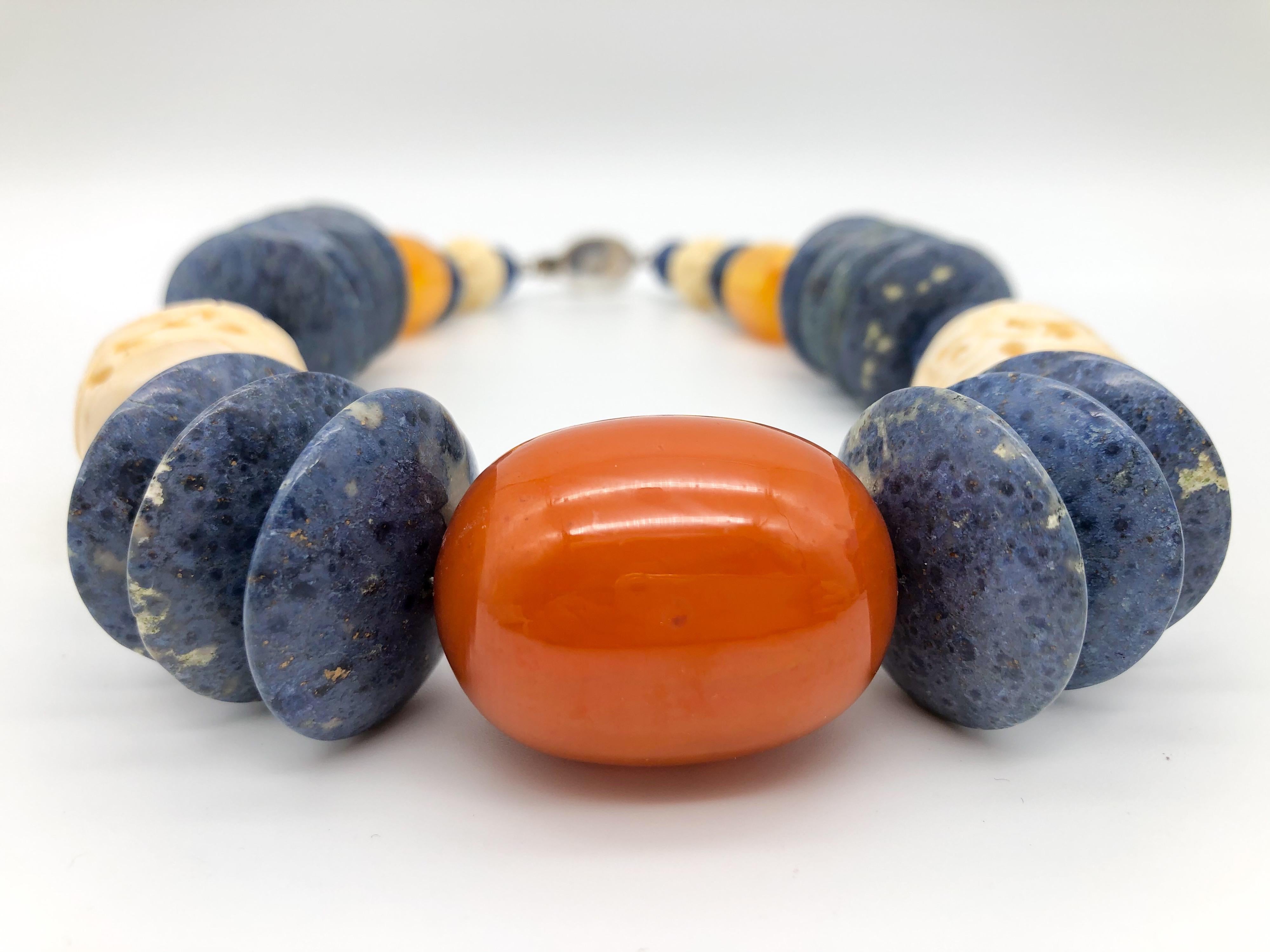 A.Jeschel Kyanite, coral, sodalite combine in bold, strong necklace.  In New Condition In Miami, FL