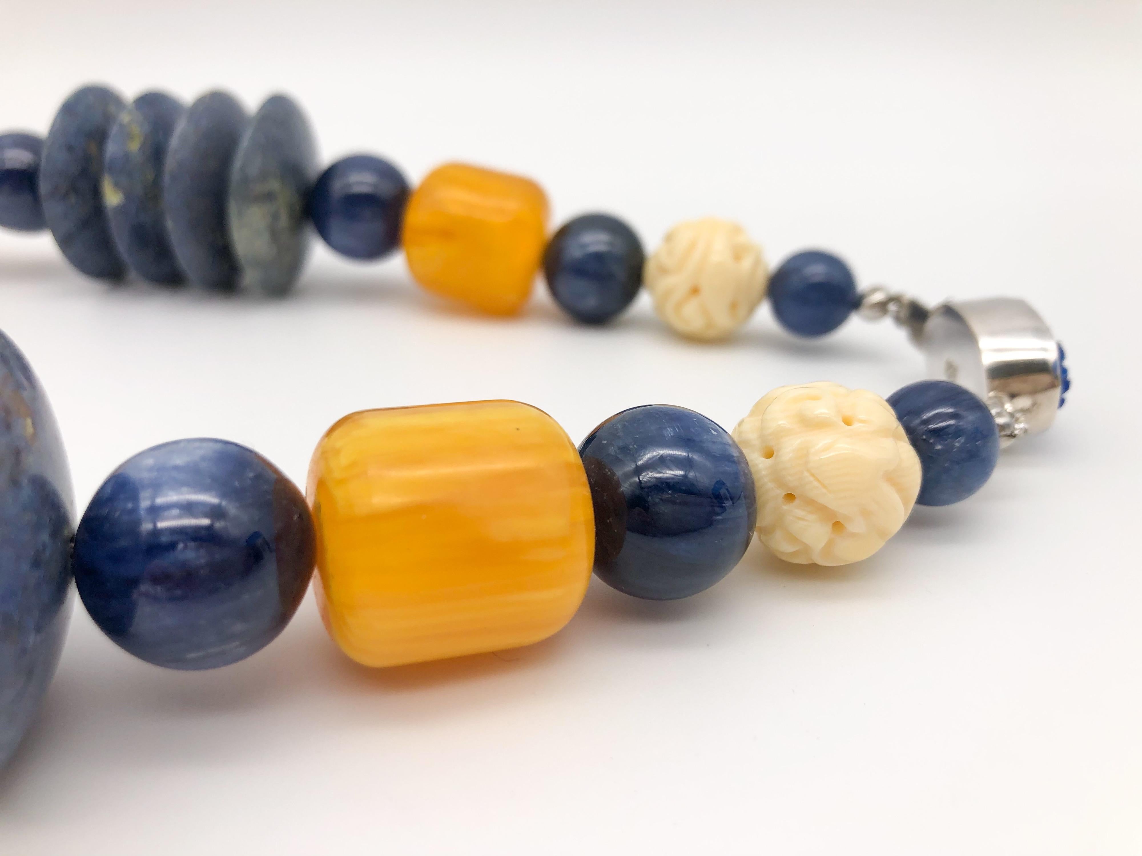 A.Jeschel Kyanite, coral, sodalite combine in bold, strong necklace.  2