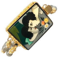 A.Jeschel Chagall’s kiss Labradorite bracelet says “I love you.”