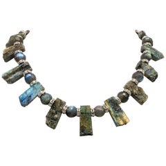 A.Jeschel Labradorite polished and rough plates with accent grey Pearls