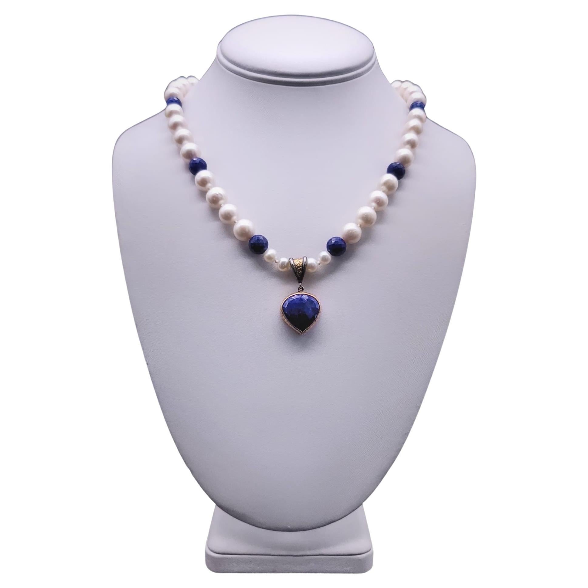 One-of-a-Kind

Hand-crafted Heart shaped faceted Lapis Lazuli pendant from the workbench of Bora  (BORA based in a small studio in Brooklyn, NY. Their designs are influenced by Mediterranean culture and have their roots in a centuries-old