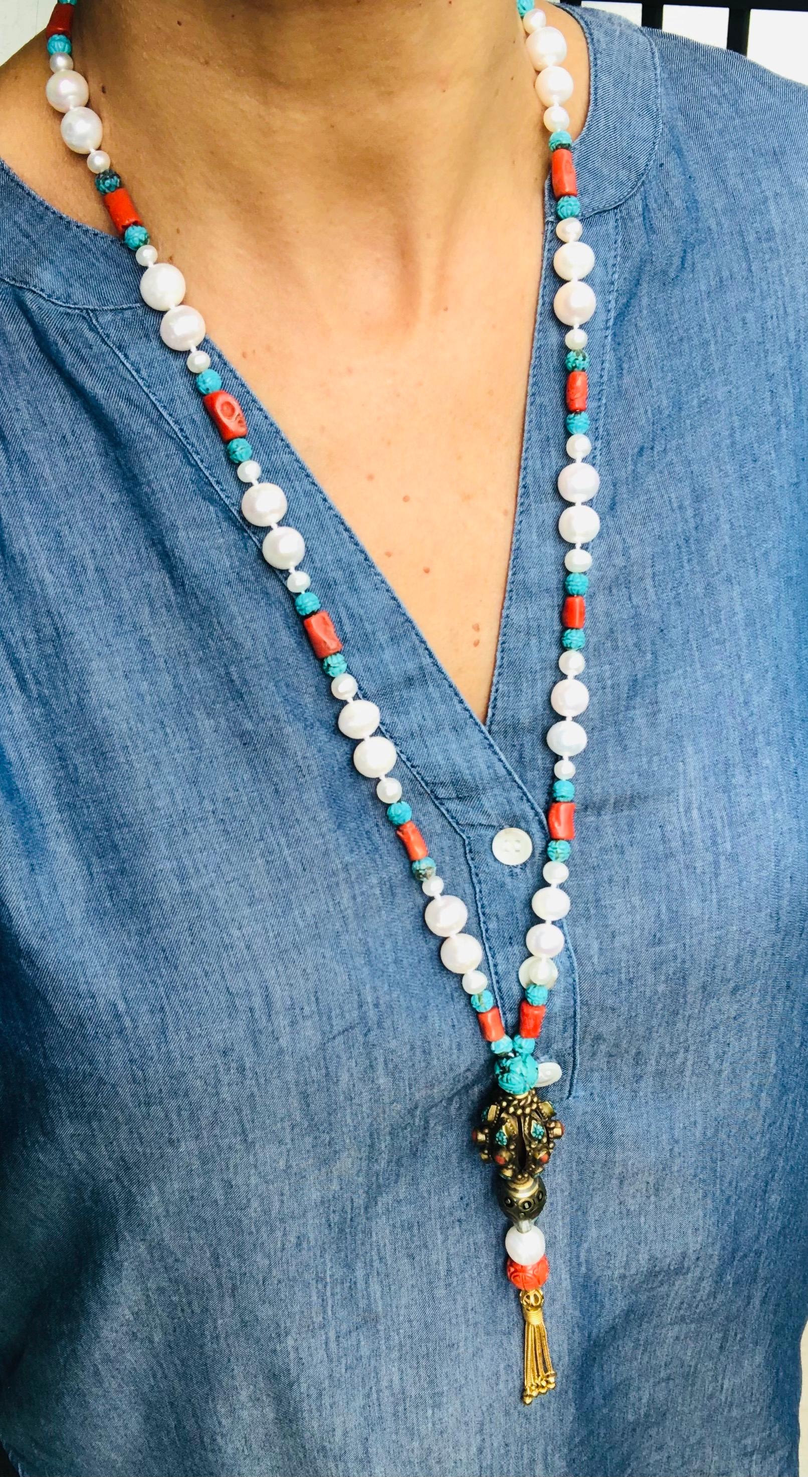 Contemporary A.Jeschel Elegant Long Pearl necklace with Tibetan Pendant. For Sale