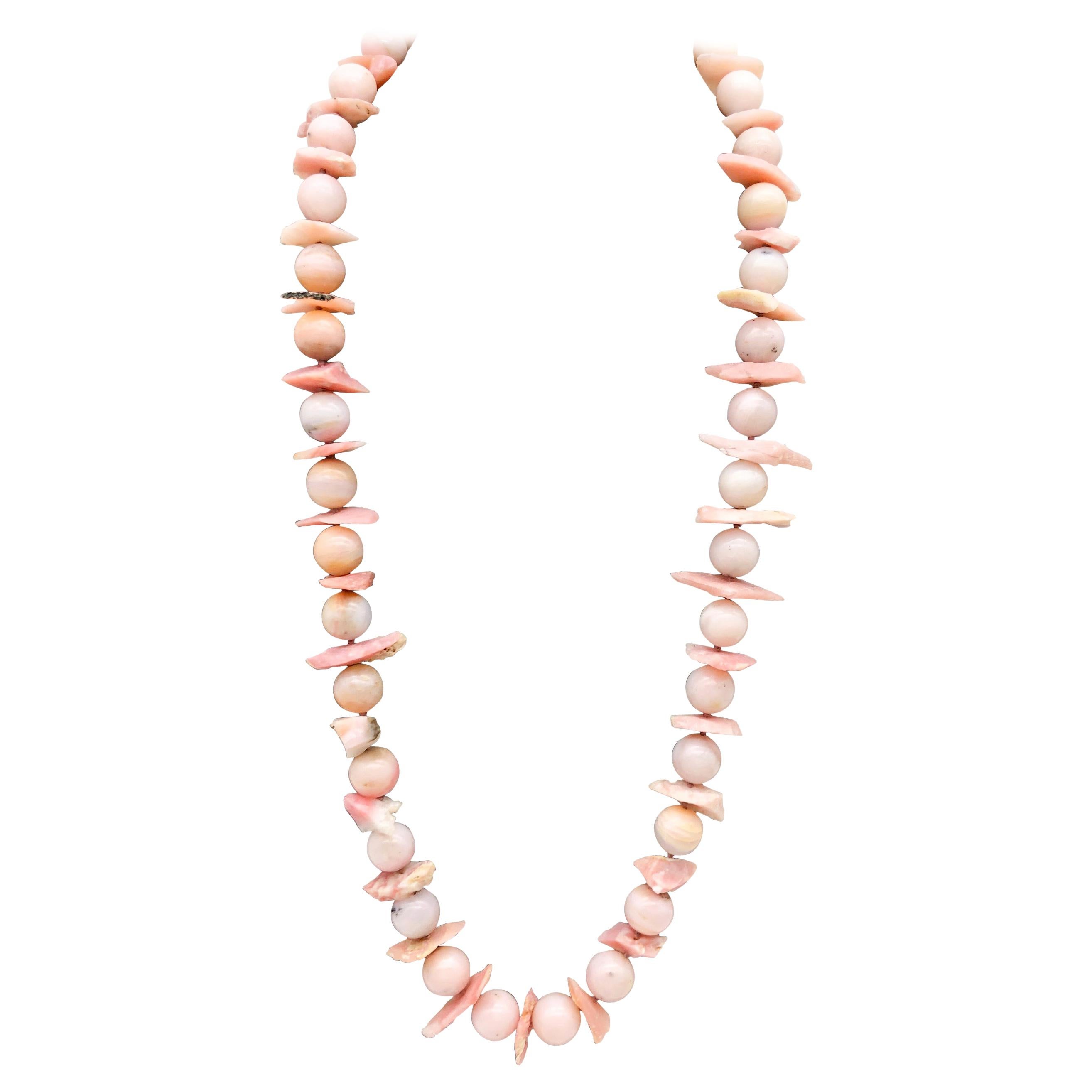 One-of-a-Kind
Unlike most you'll ever see, a necklace with opaque Pink Peruvian Opal polished beads is unique in its shadings and natural patterns. Together, the large 14mm beads create a one-of-a-kind showcase for the popular blush-pink palette.