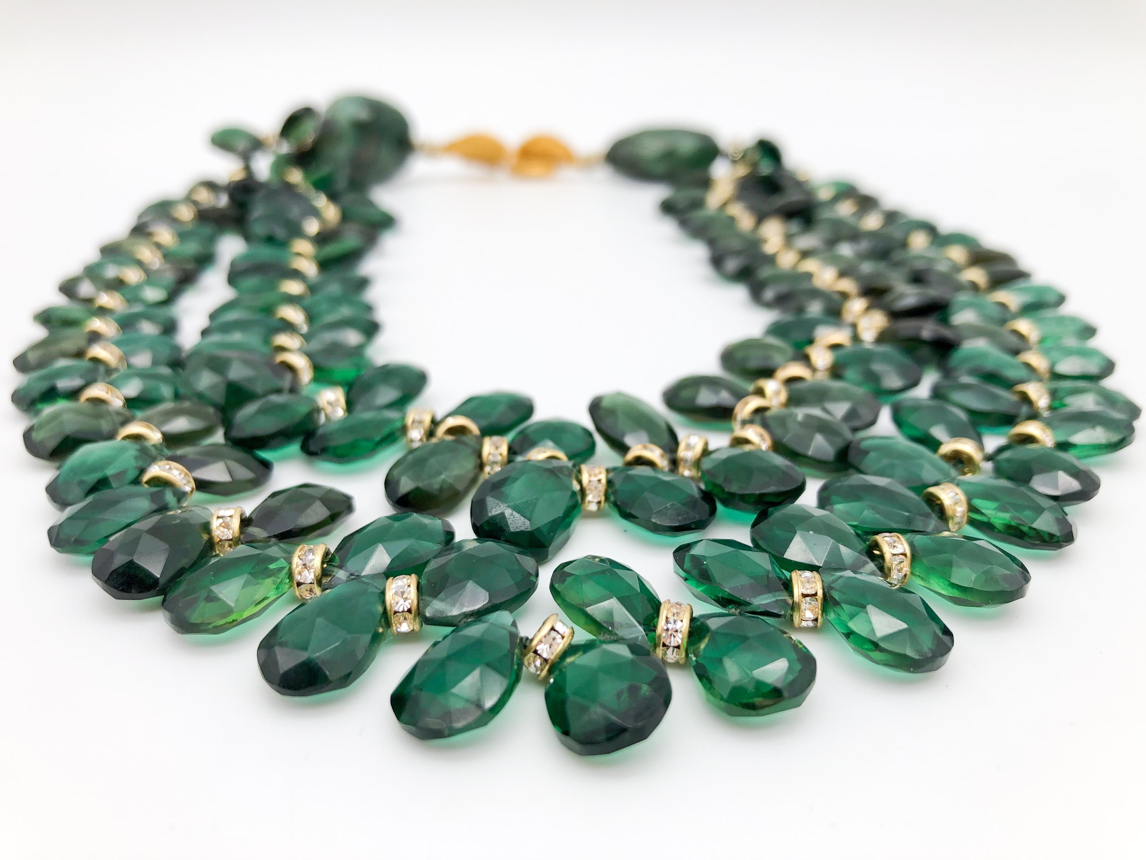 One-of-a-Kind
Show stopper double-strand faceted Green Quartz, teardrop cut beads have a vitreous luster with high brilliance, show exceptional faceting and polish, are well-matched with Cz spacers, and 2 hand-cut faceted Emeralds. The necklace is