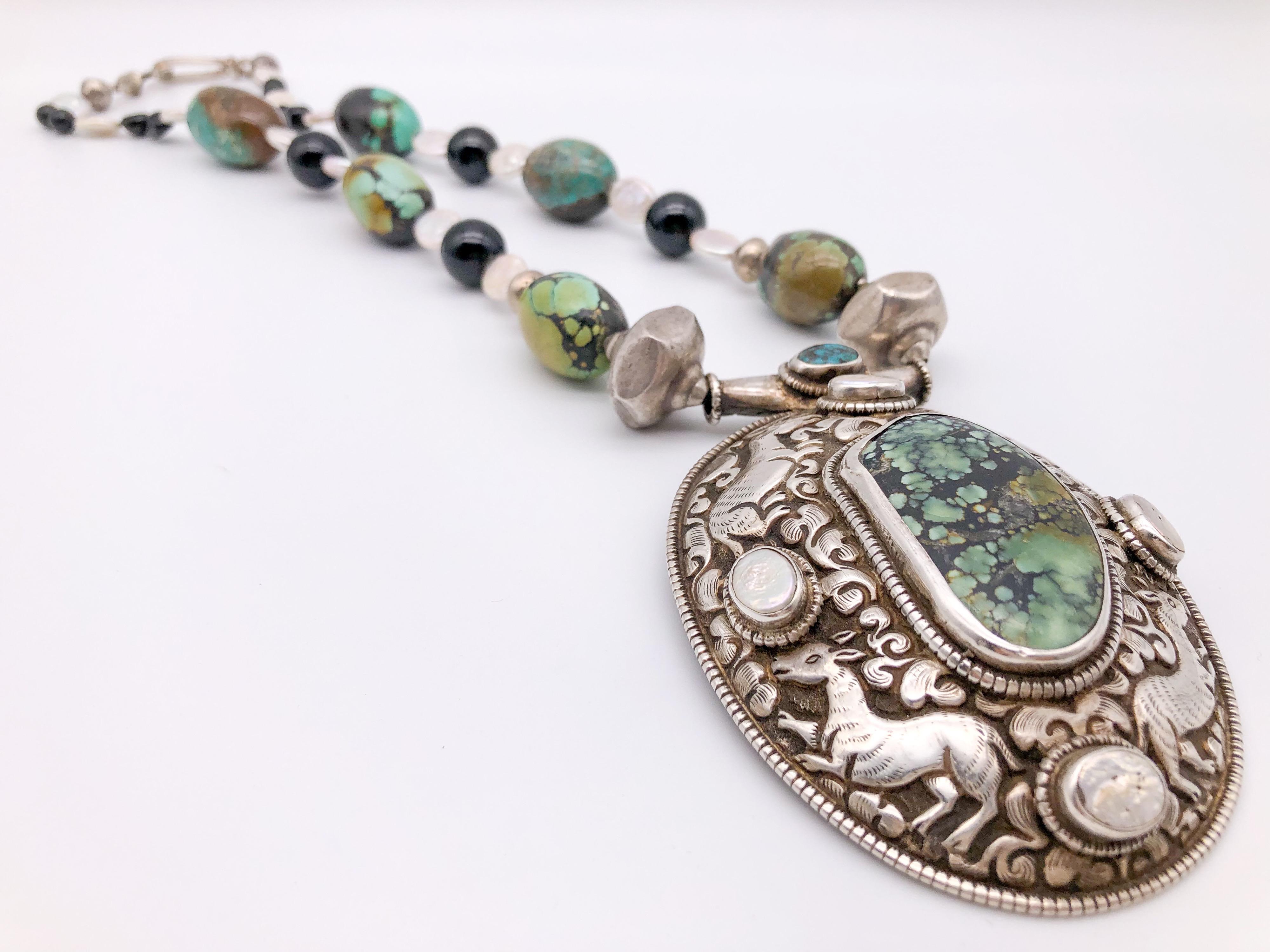 Mixed Cut A.Jeschel Marvelous Turquoise necklace with Tibetan Pendant For Sale